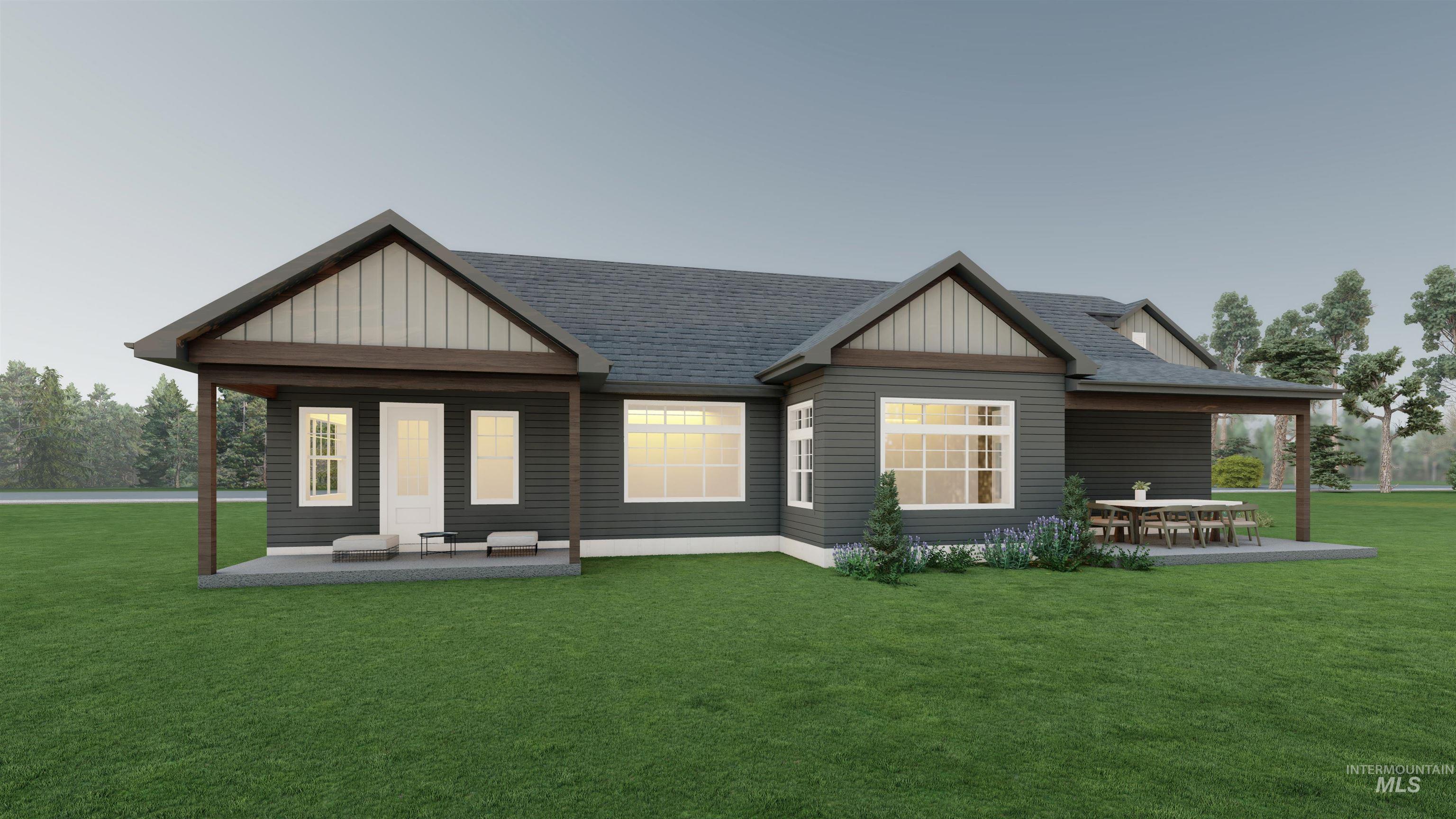 Back of house featuring roof with shingles, a yard, and covered porch