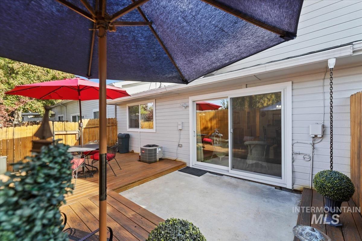 Wooden terrace with outdoor dining area