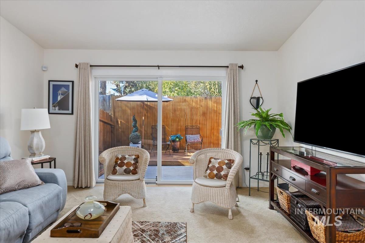 Living room featuring carpet floors