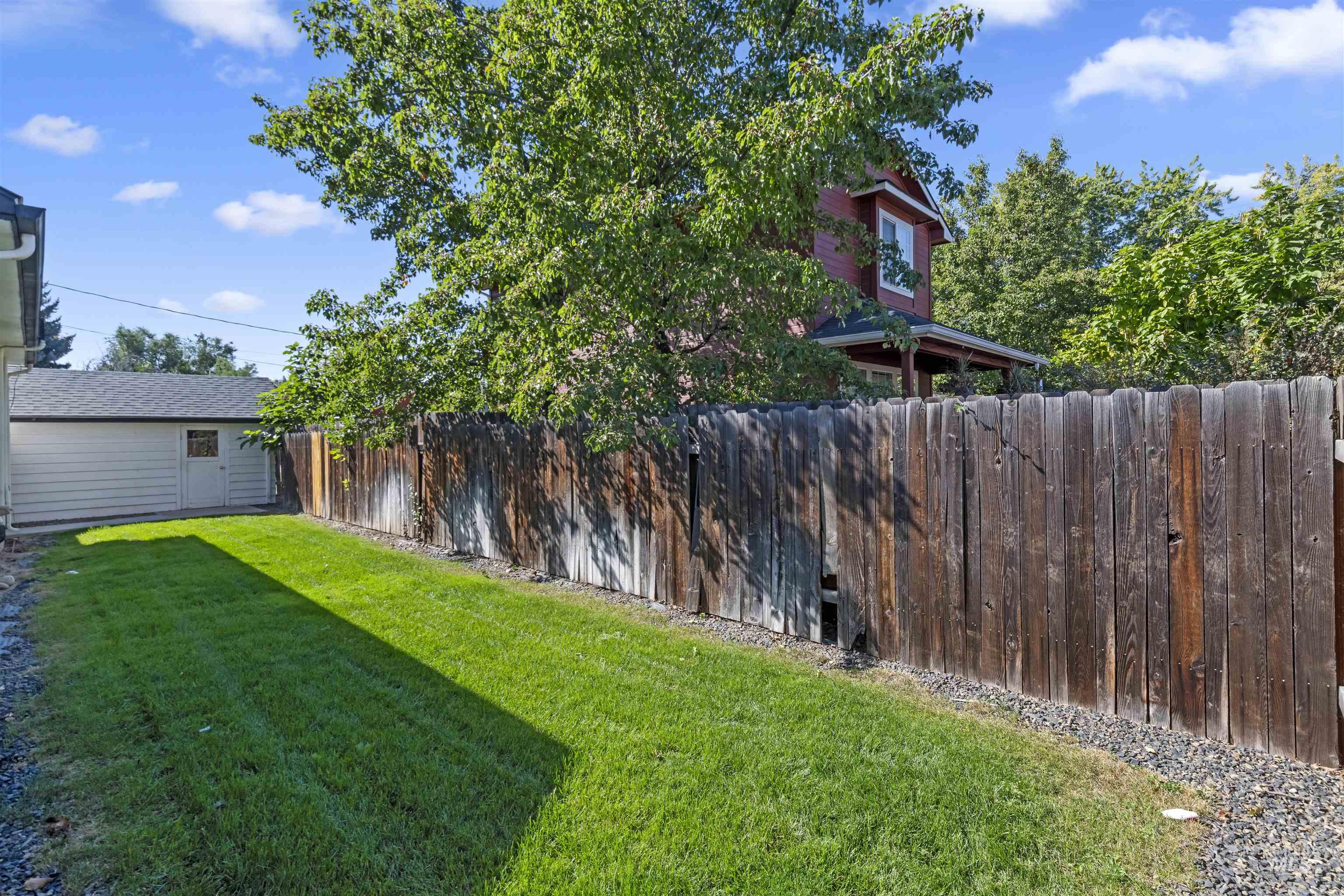View of fenced backyard