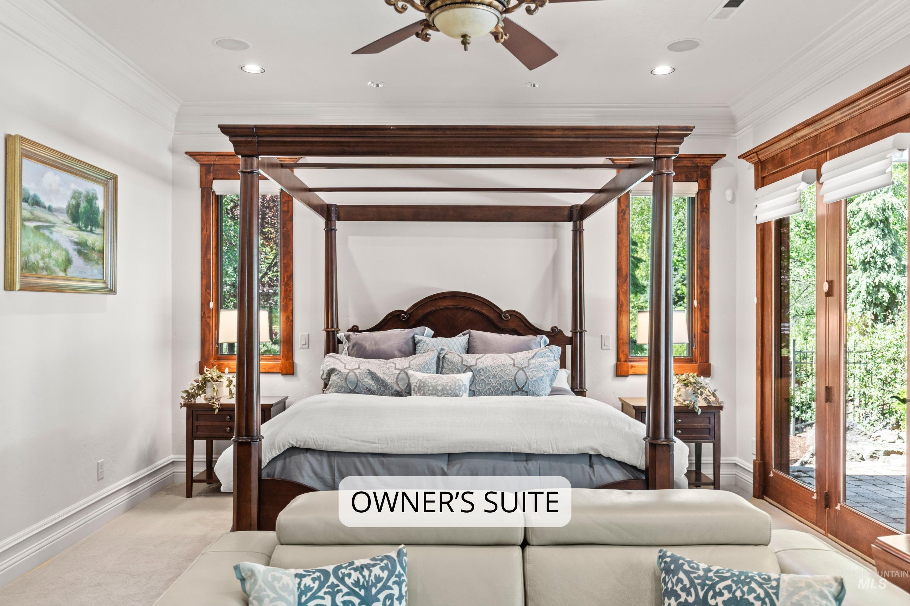Wood-trimmed windows and patio doors frame verdant outdoor scenery