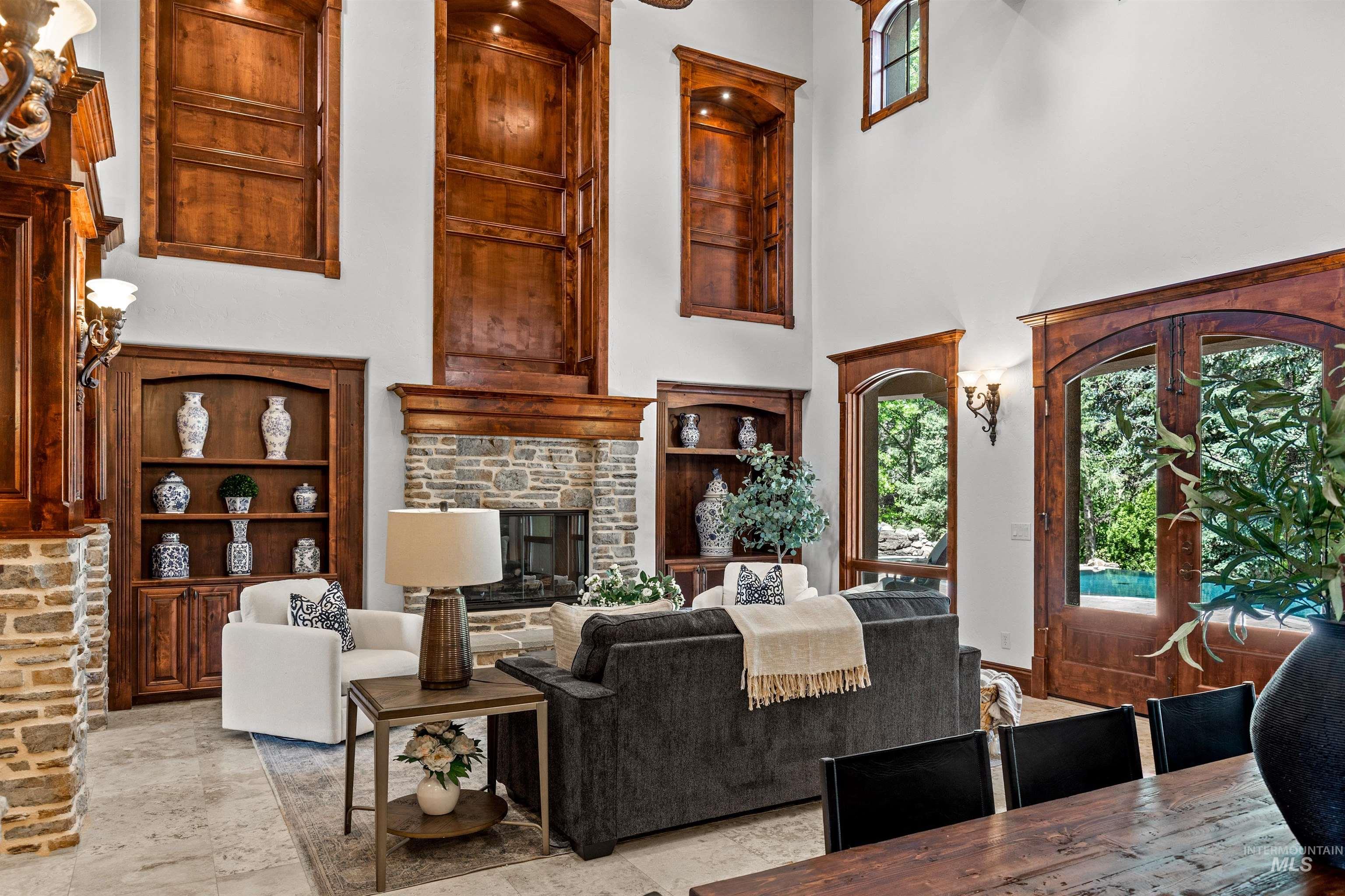 Great room with high ceilings and light-toned walls