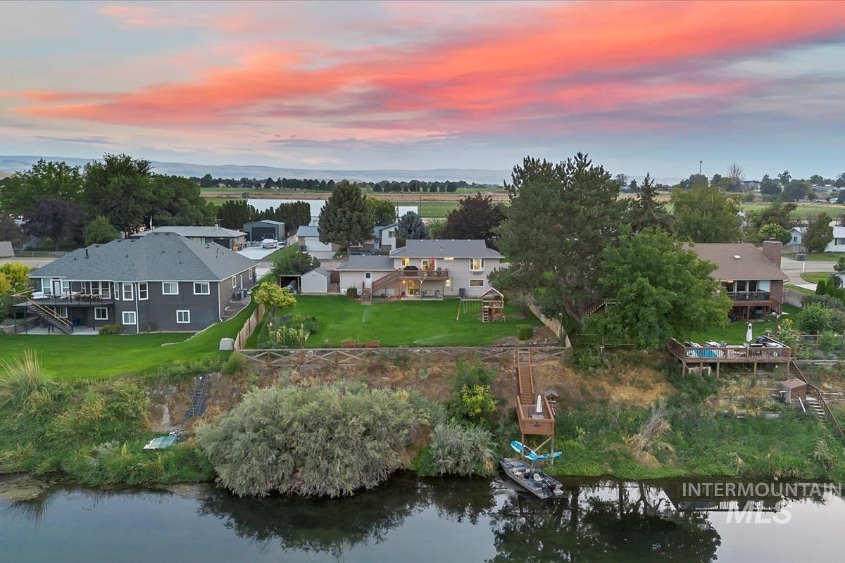 Aerial view of residential area with a nearby body of water