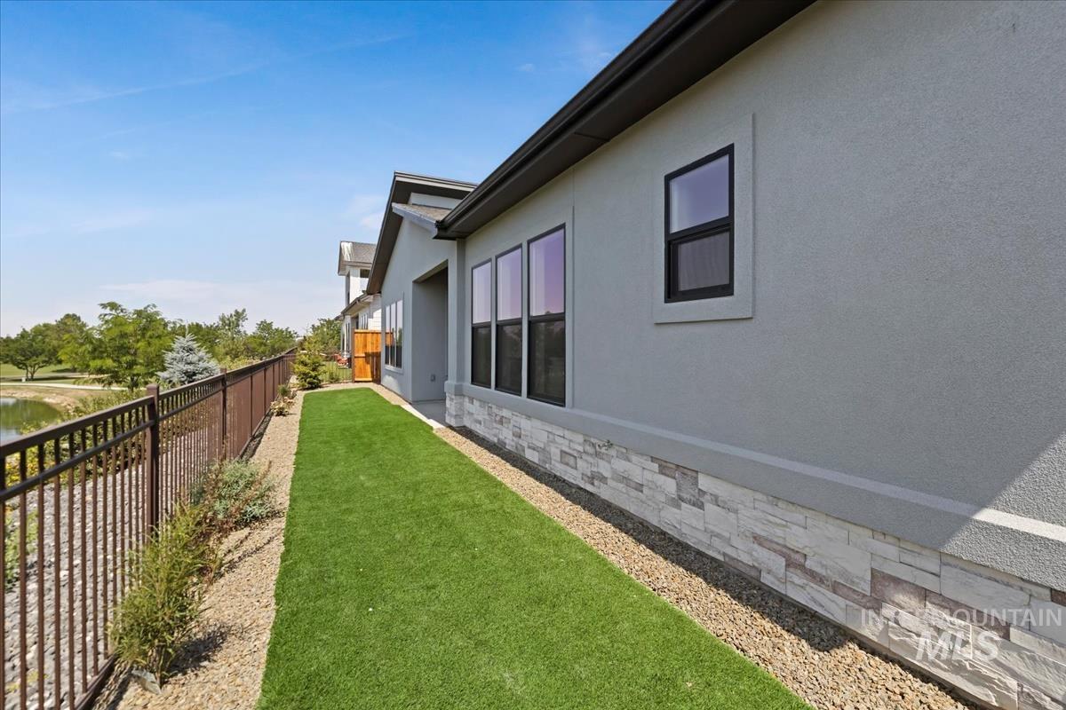 View of fenced backyard