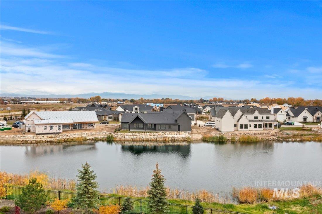 Water view featuring nearby suburban area