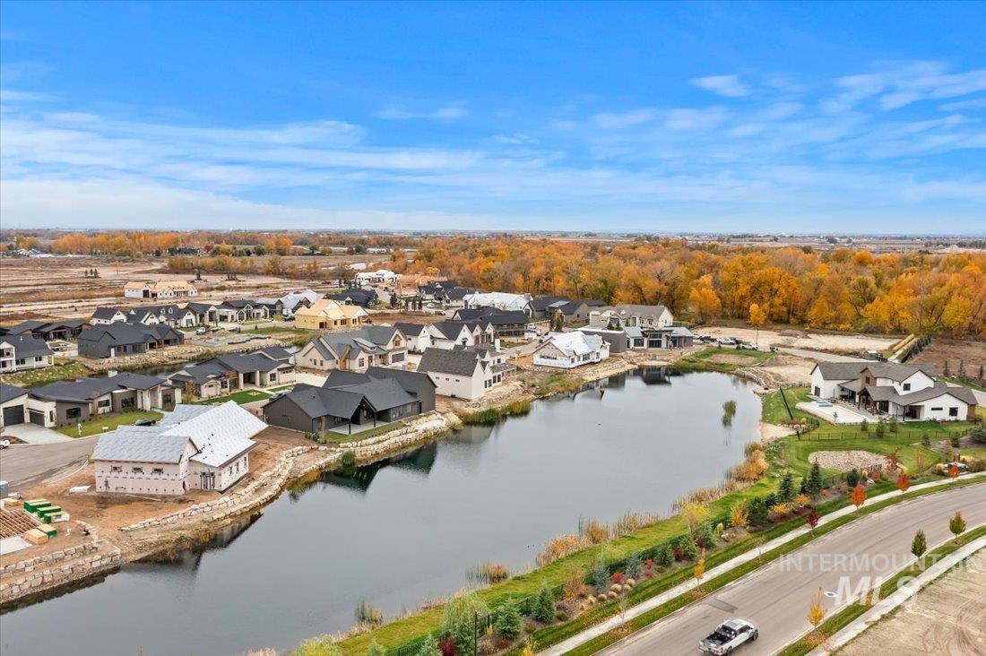 Aerial view of residential area with a large body of water