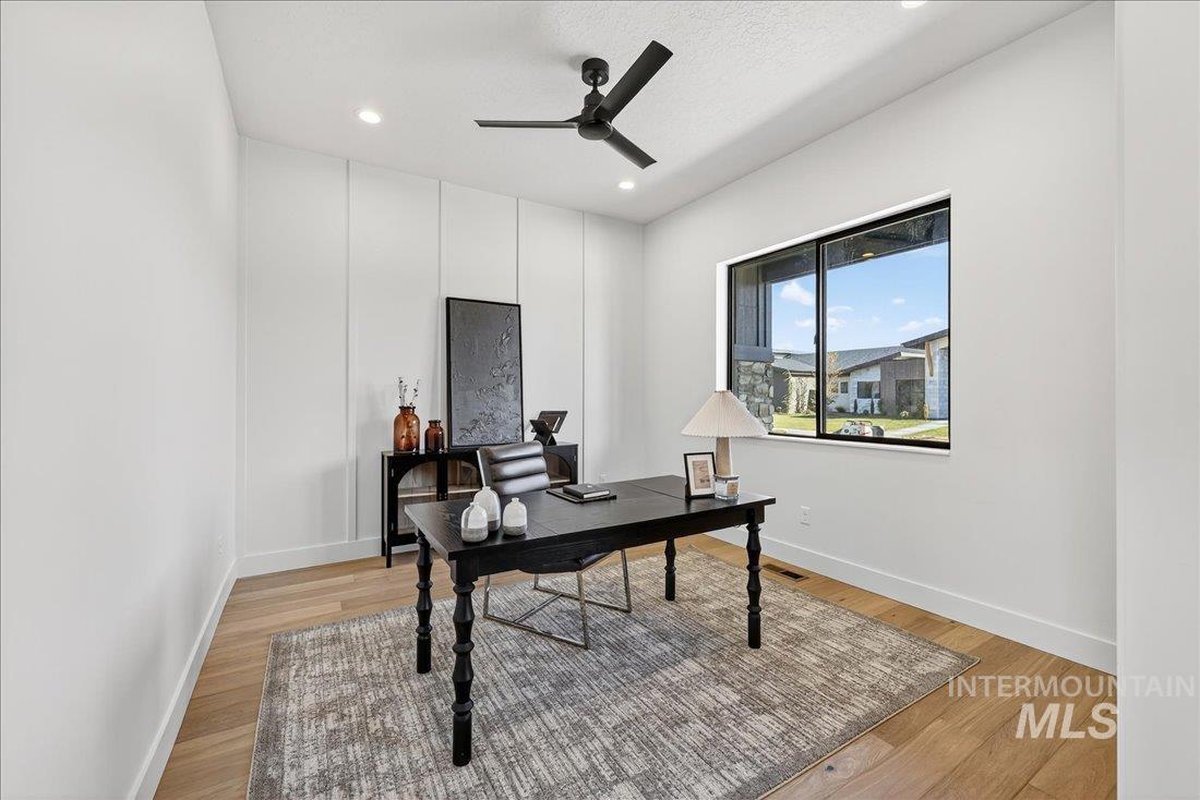 Office featuring ceiling fan, light wood-style flooring, recessed lighting, and a textured ceiling