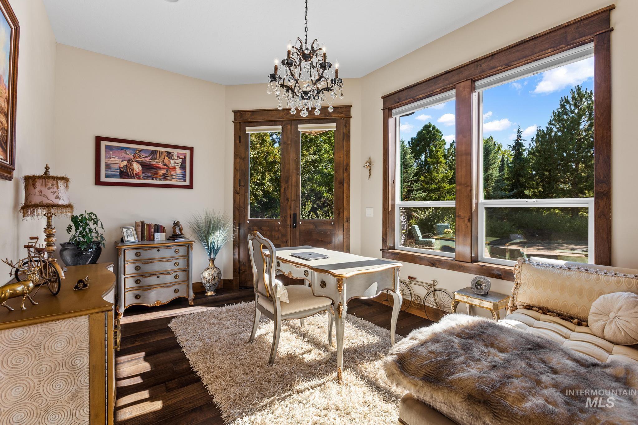 Dining room with a chandelier and wood finished floors