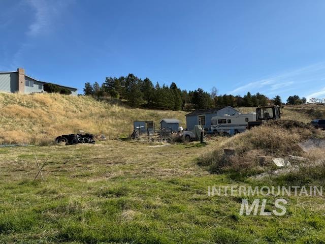 View of yard with a view of countryside