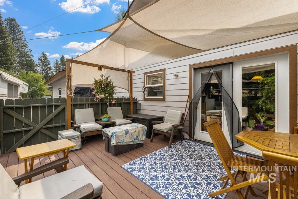 Accessed from the dining and kitchen portion of the great room.