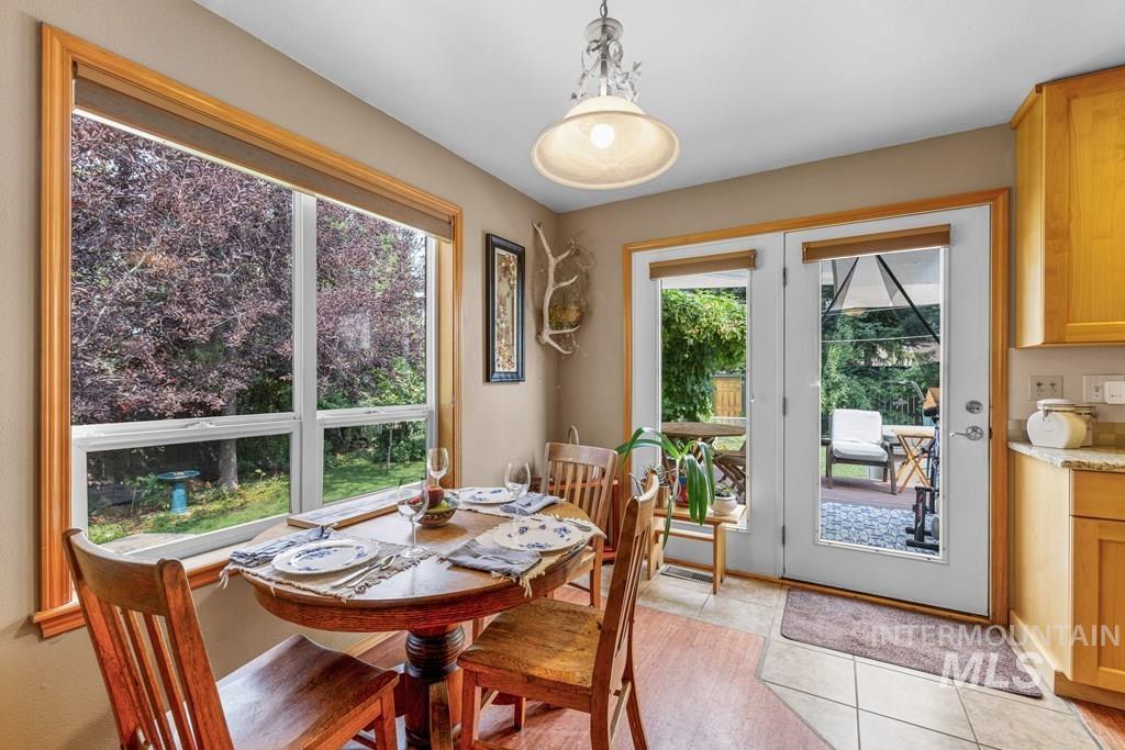 As part of the great room, the dining area has easy access to the back yard for BBQ's