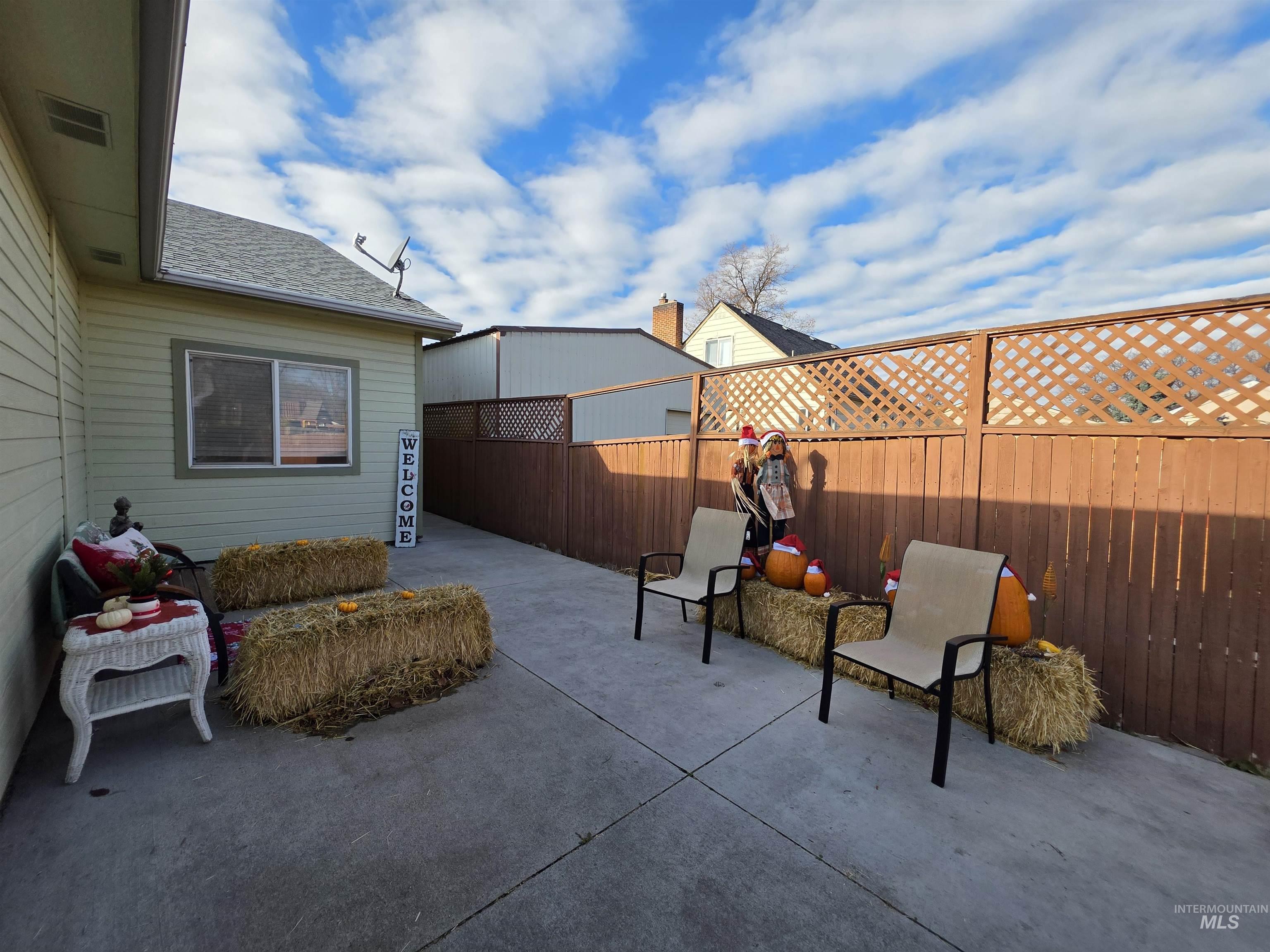 Fenced backyard featuring a patio area