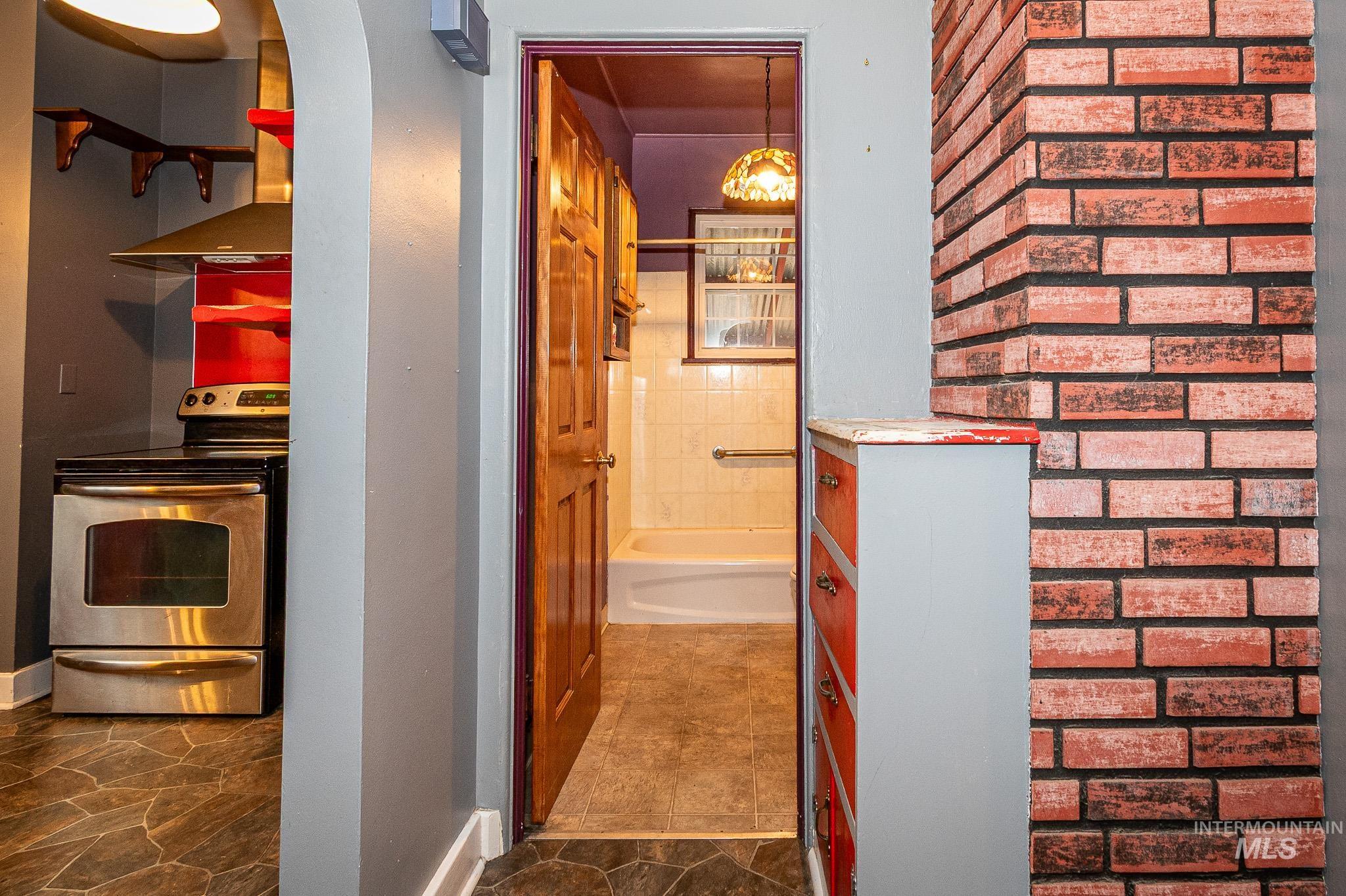 Bathroom with tub / shower combination and vanity