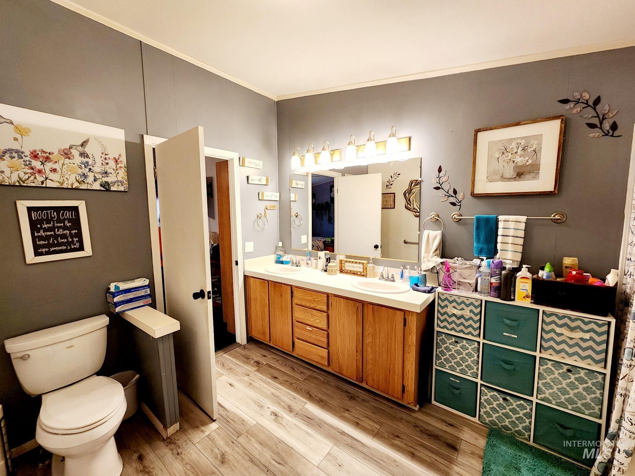 Onsuite with dual vanities and walkin shower.