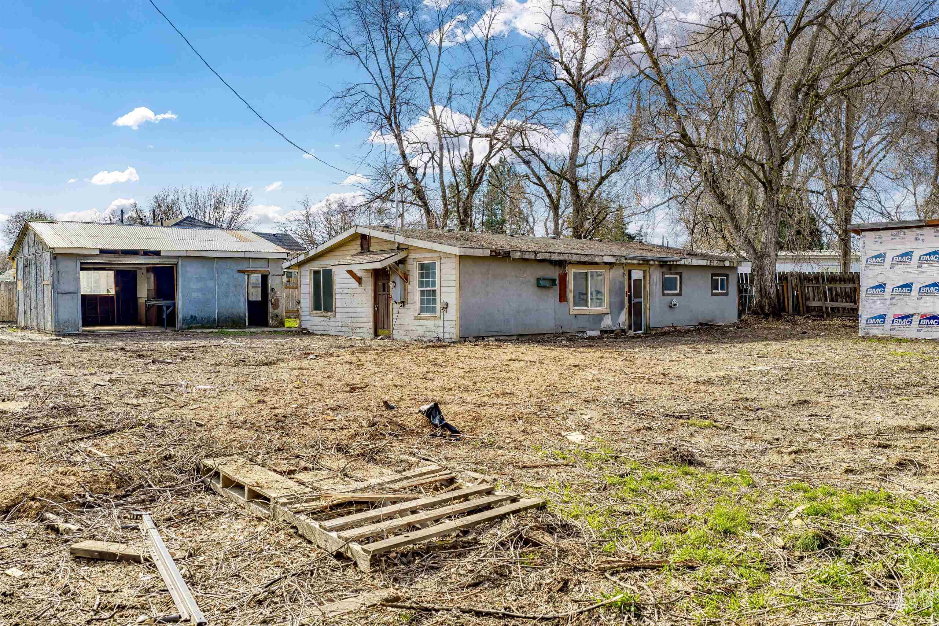 Back of property with stucco siding