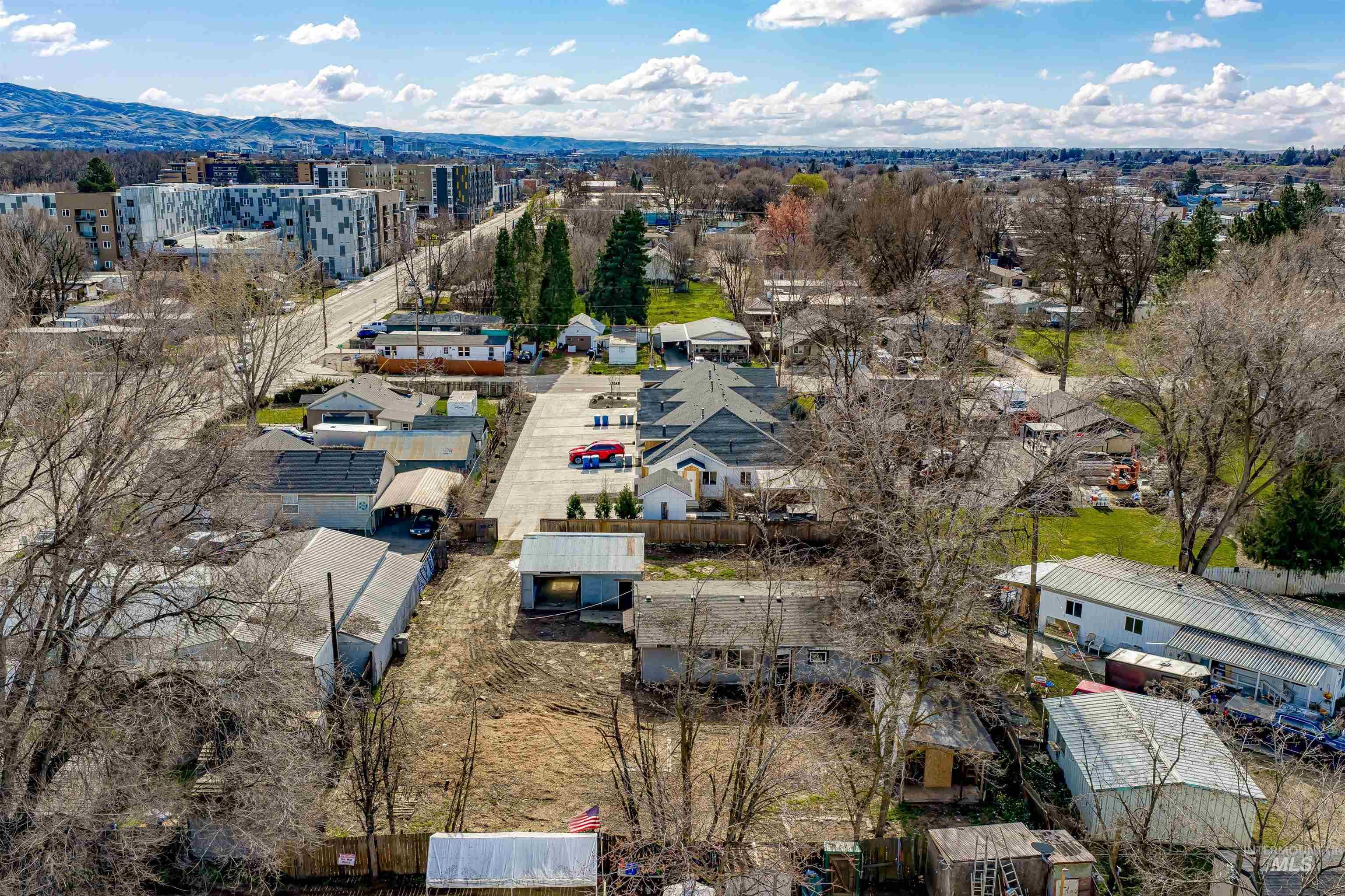 Aerial view of residential area with a mountain backdrop