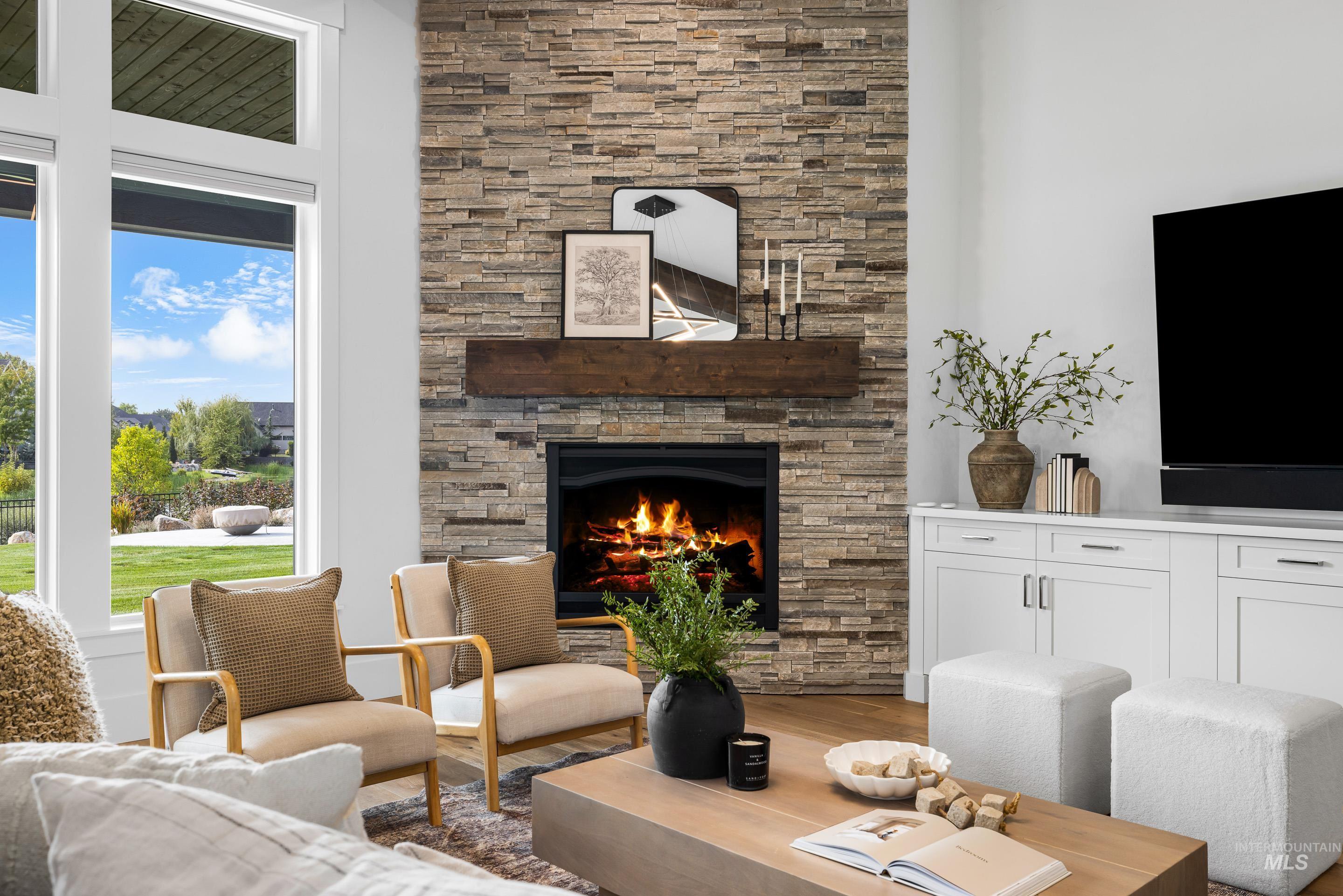 Living room featuring wood finished floors and a fireplace