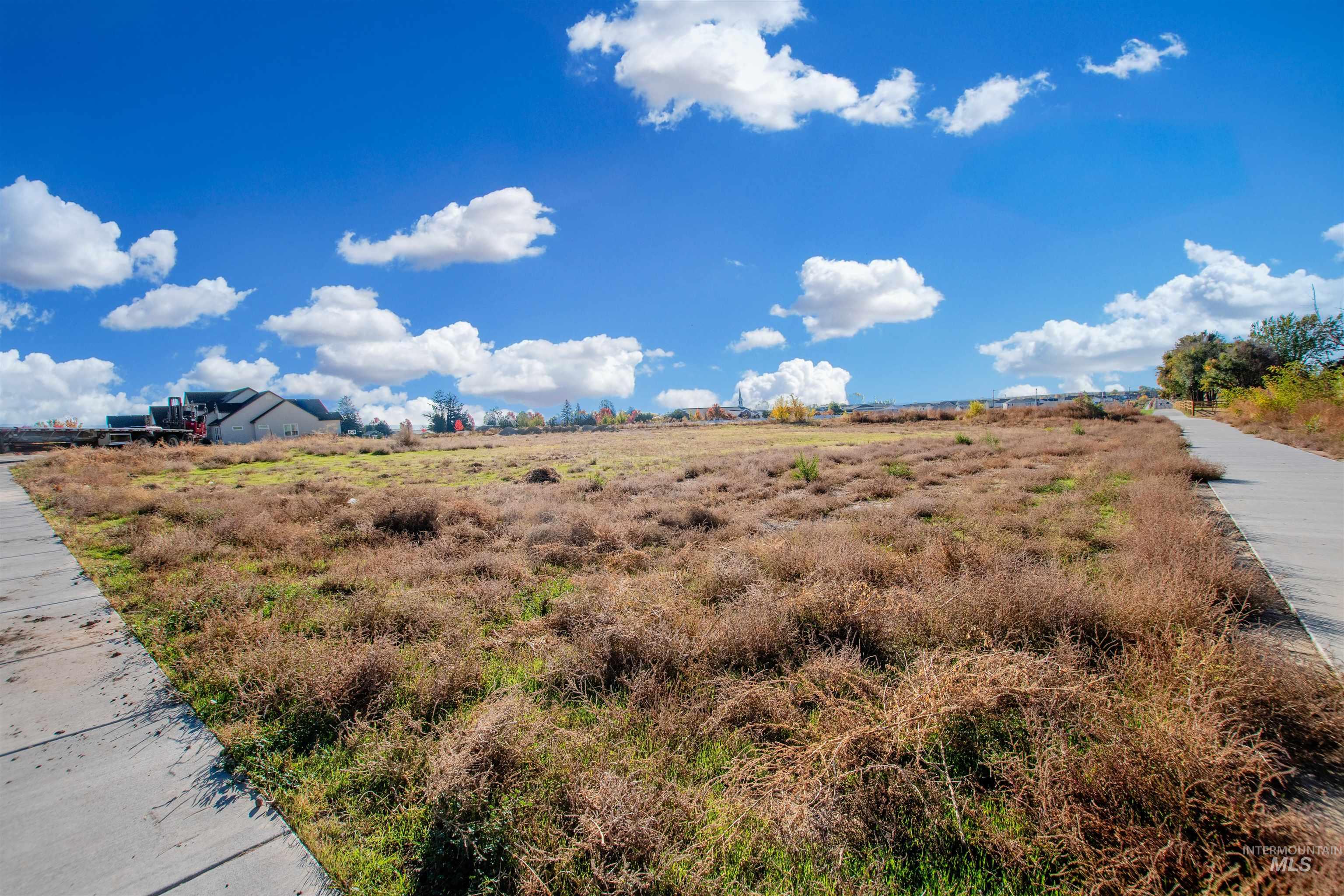 View of yard featuring a view of rural / pastoral area