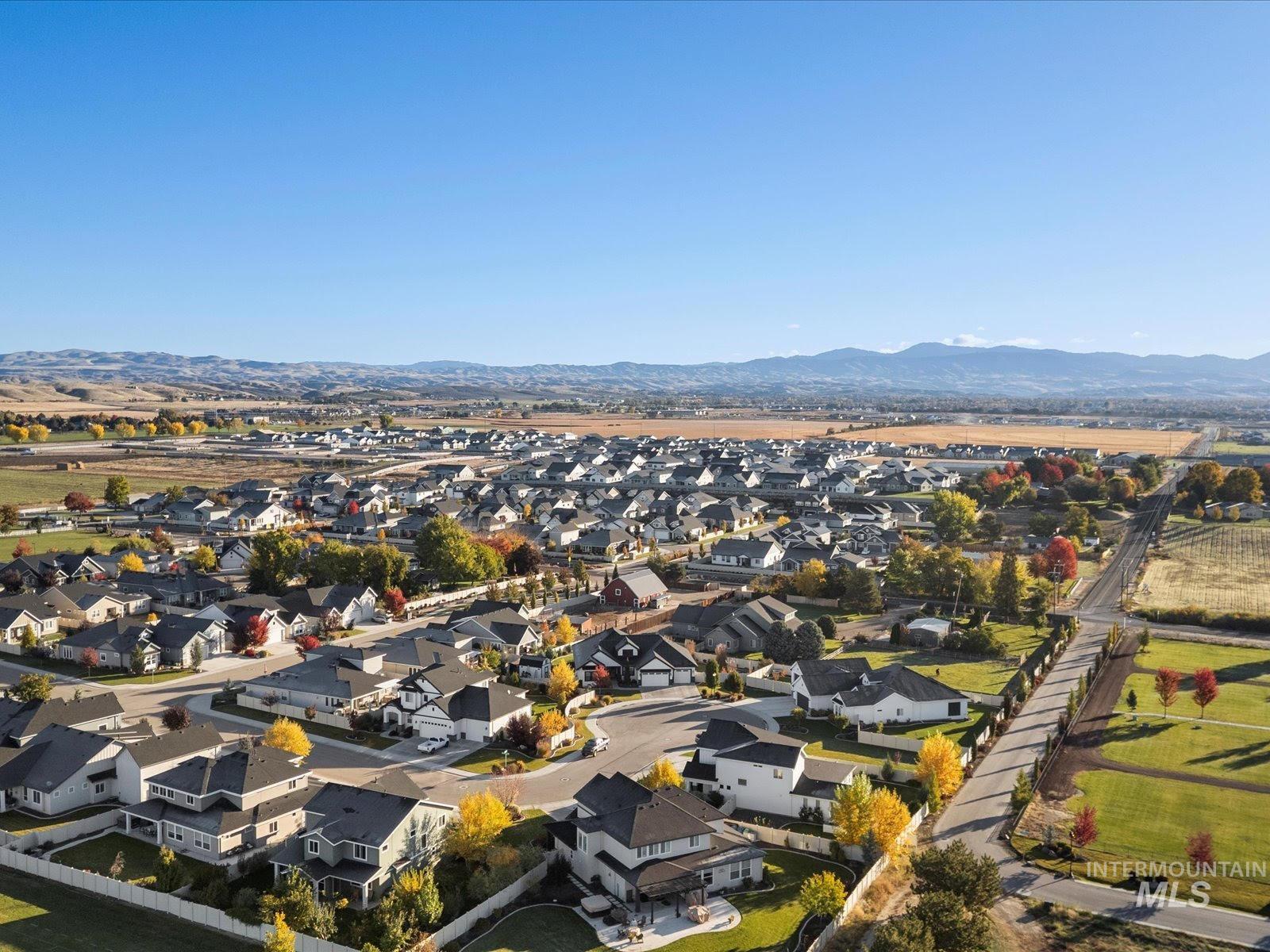 Aerial view of residential area with mountains