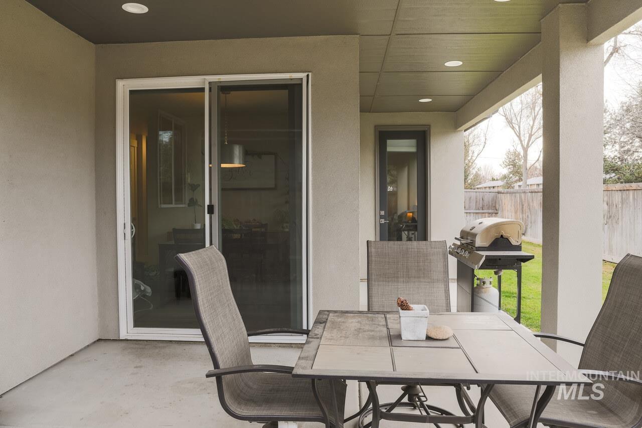 View of patio / terrace with outdoor dining area and a grill