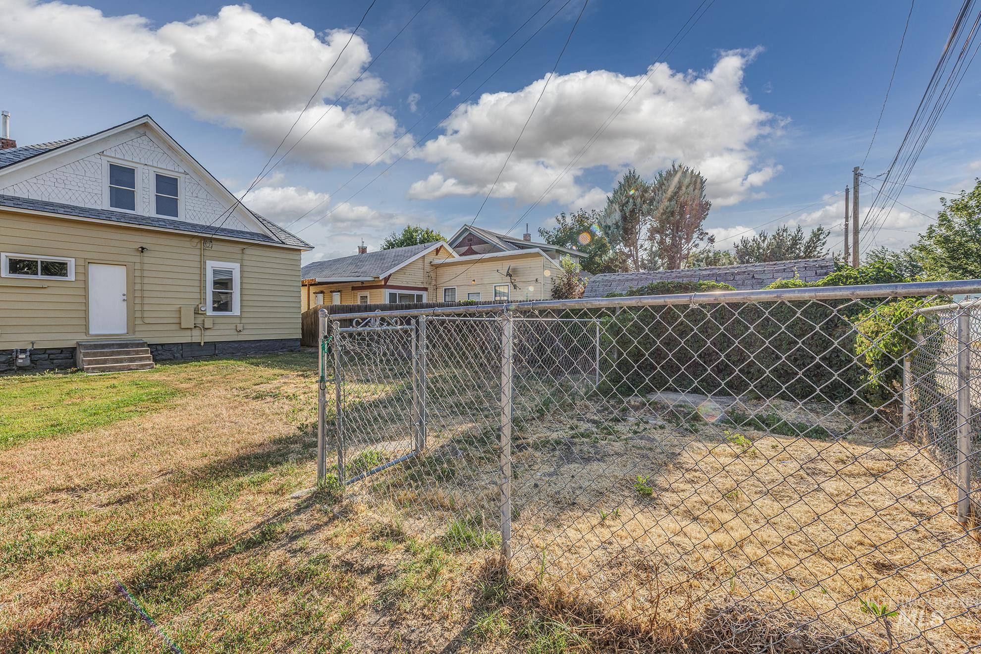 View of yard featuring entry steps
