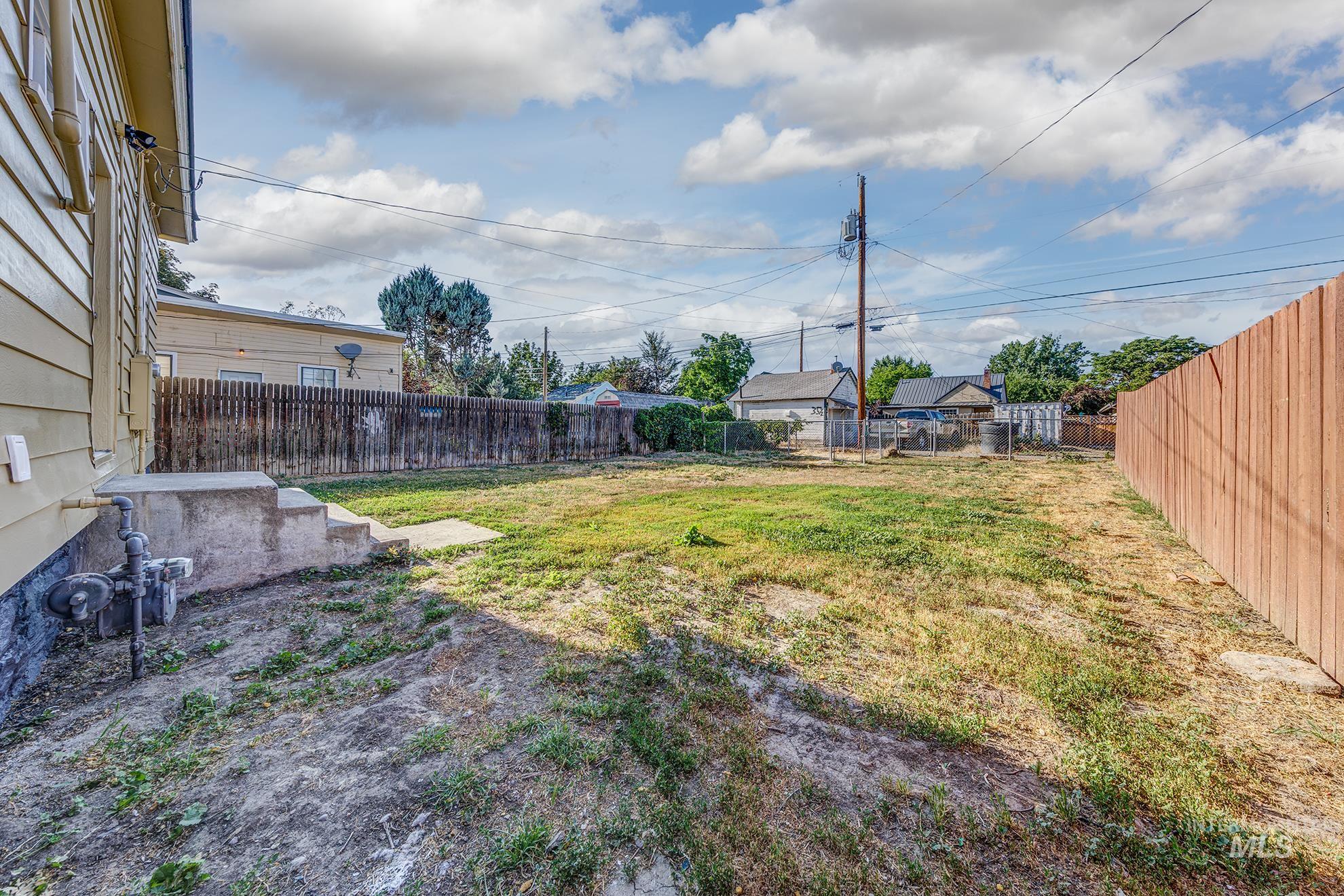 View of fenced backyard
