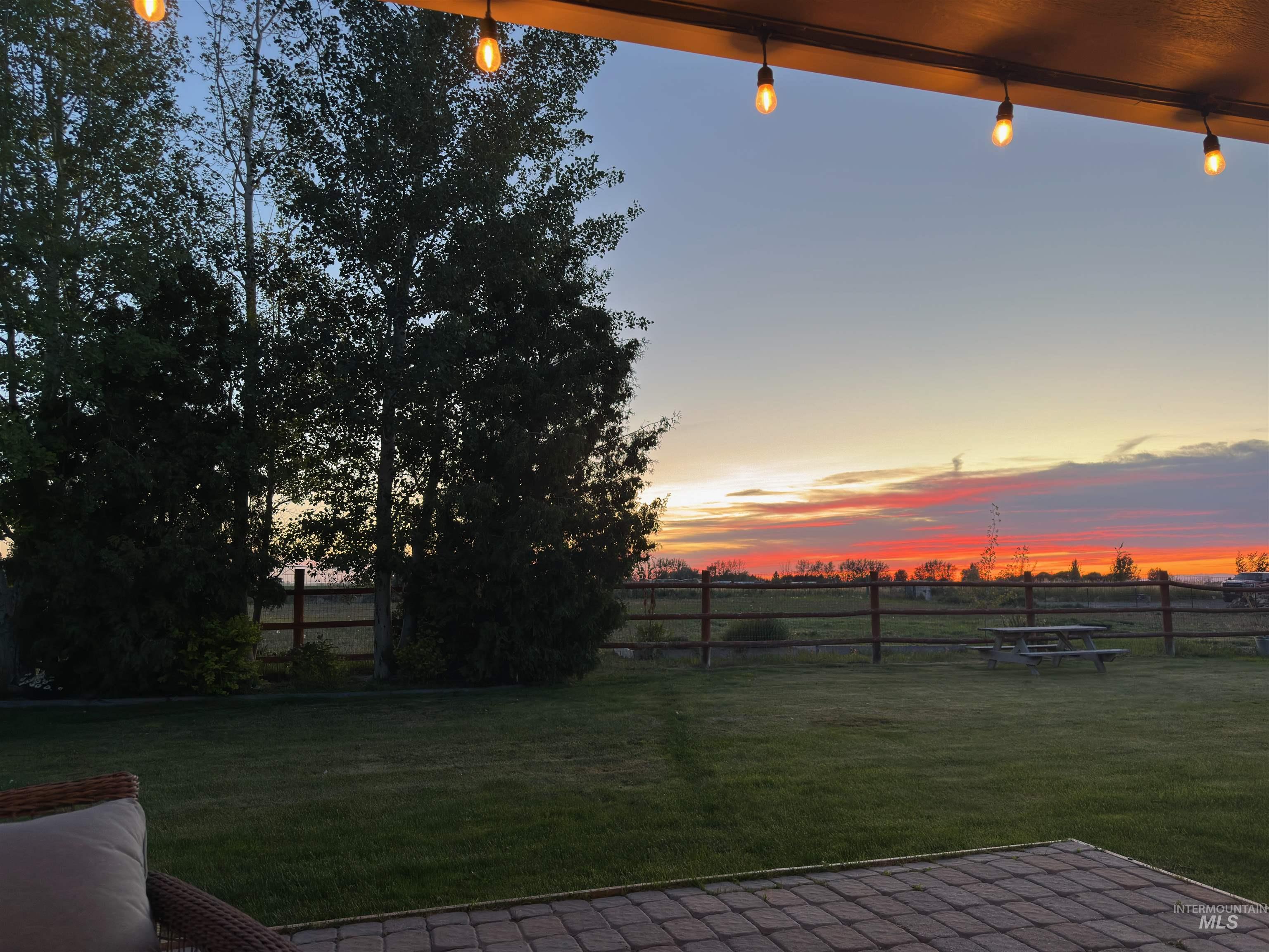 Fenced backyard with a patio area