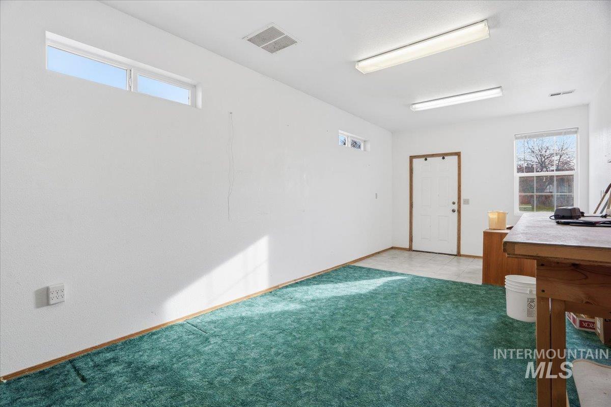 Interior space featuring healthy amount of natural light