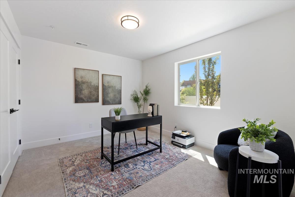 Office area with light carpet