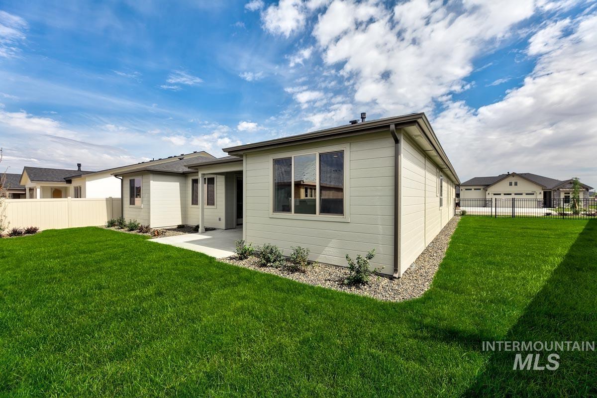 Back of property featuring a patio