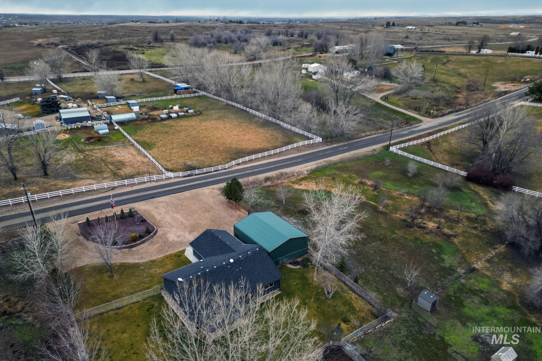 Aerial view of property's location featuring rural landscape