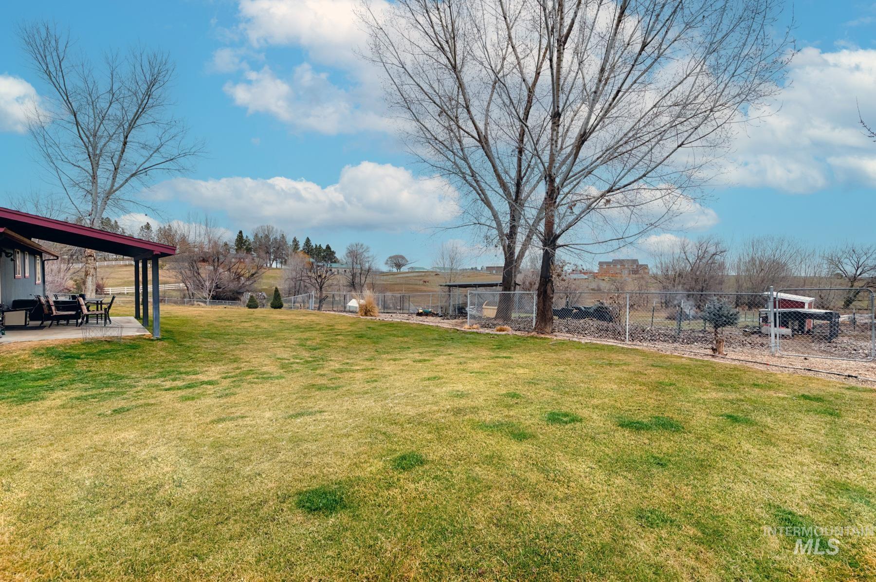 View of yard with a patio