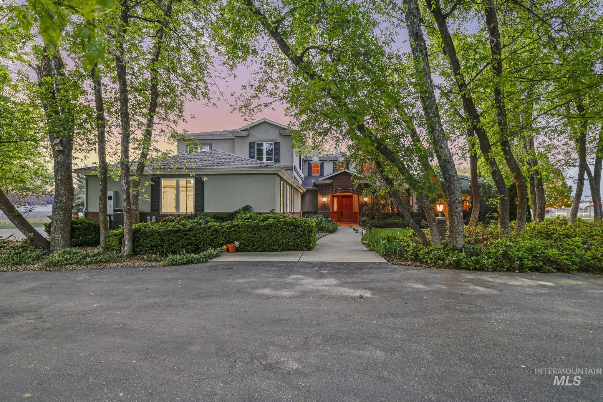 View of front of house featuring stucco siding
