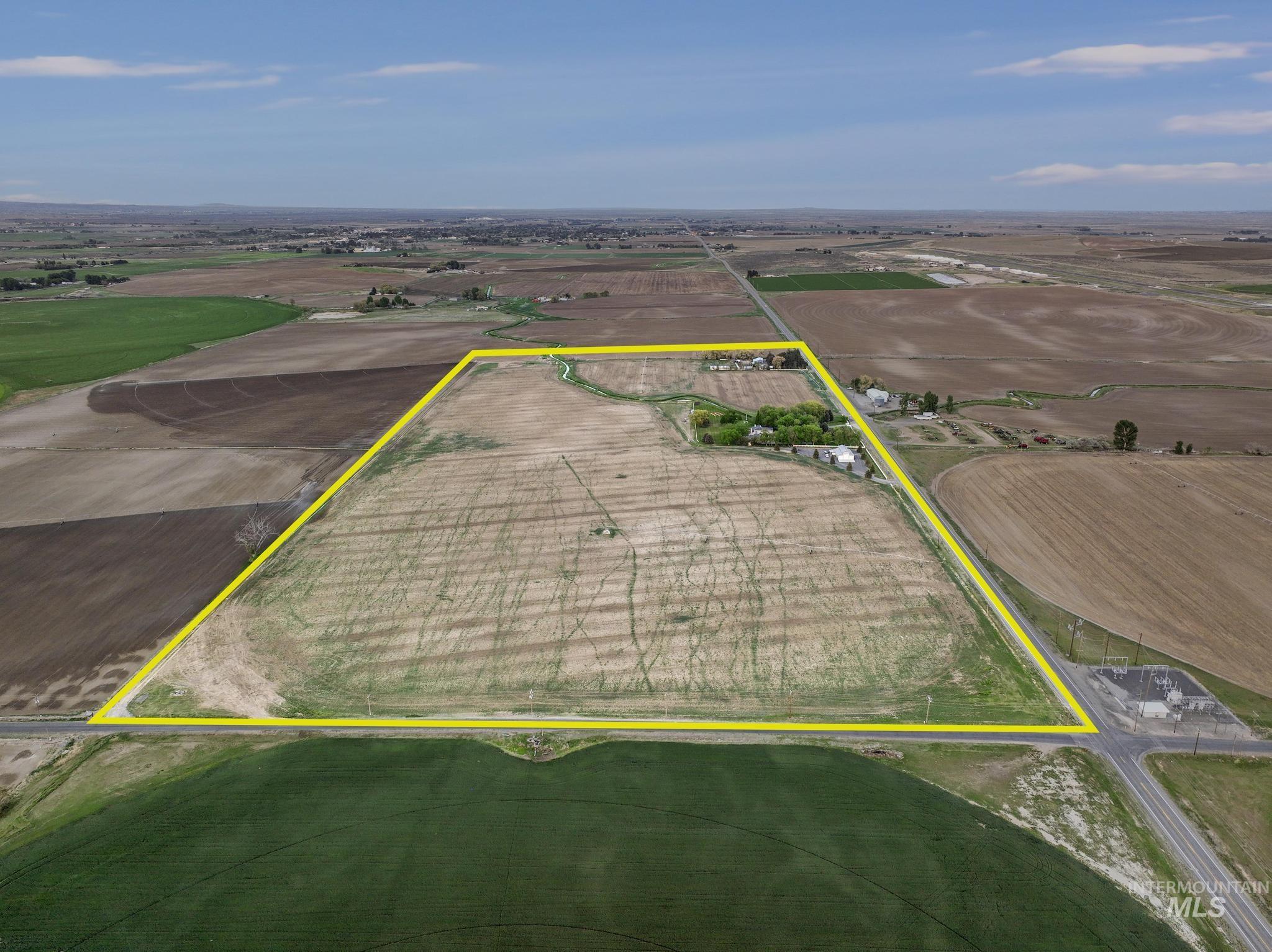 View of rural area with property parcel outlined and abundant farmland