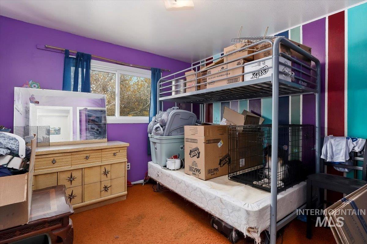 Bedroom featuring carpet flooring