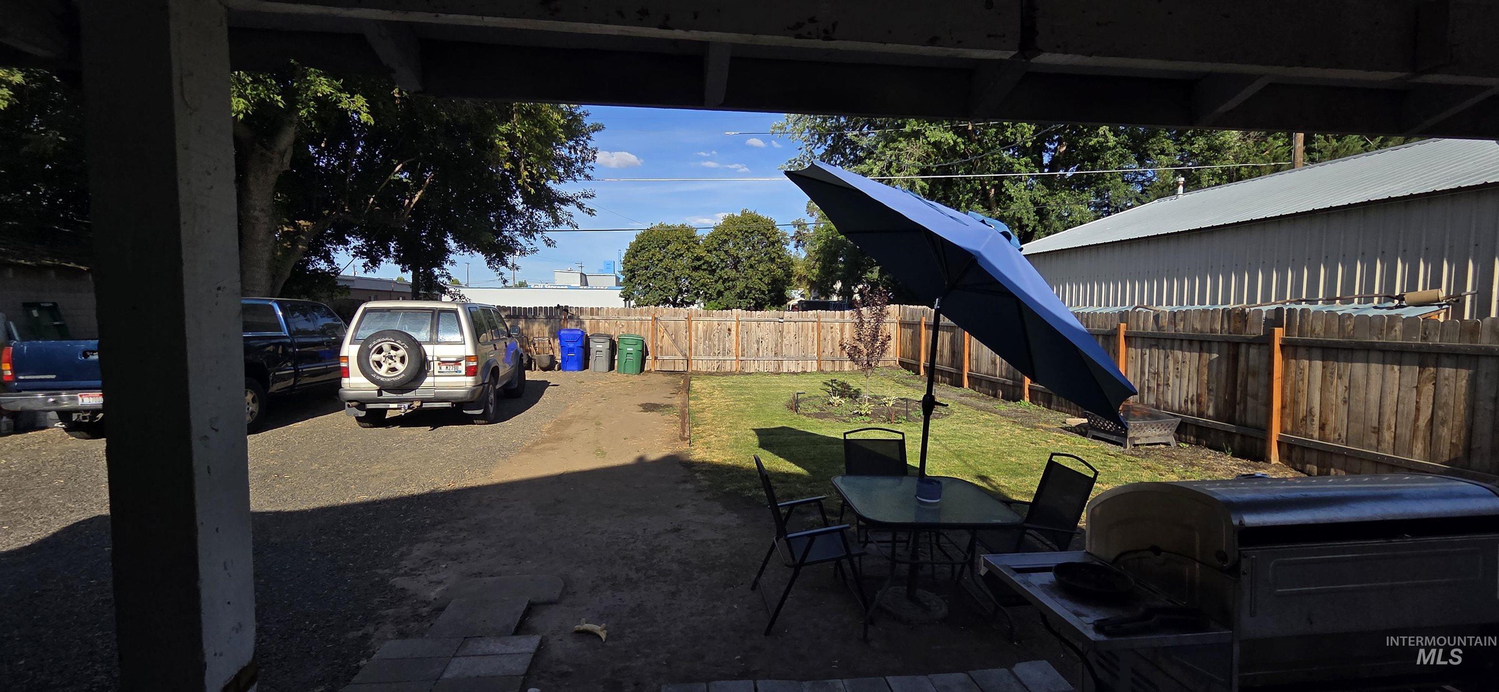 View of fenced backyard