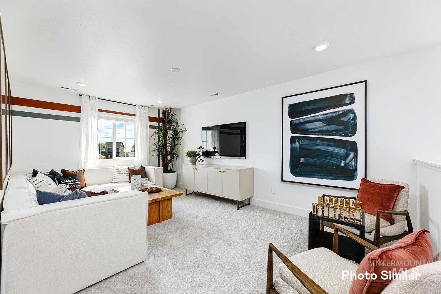 Living room featuring light carpet and recessed lighting