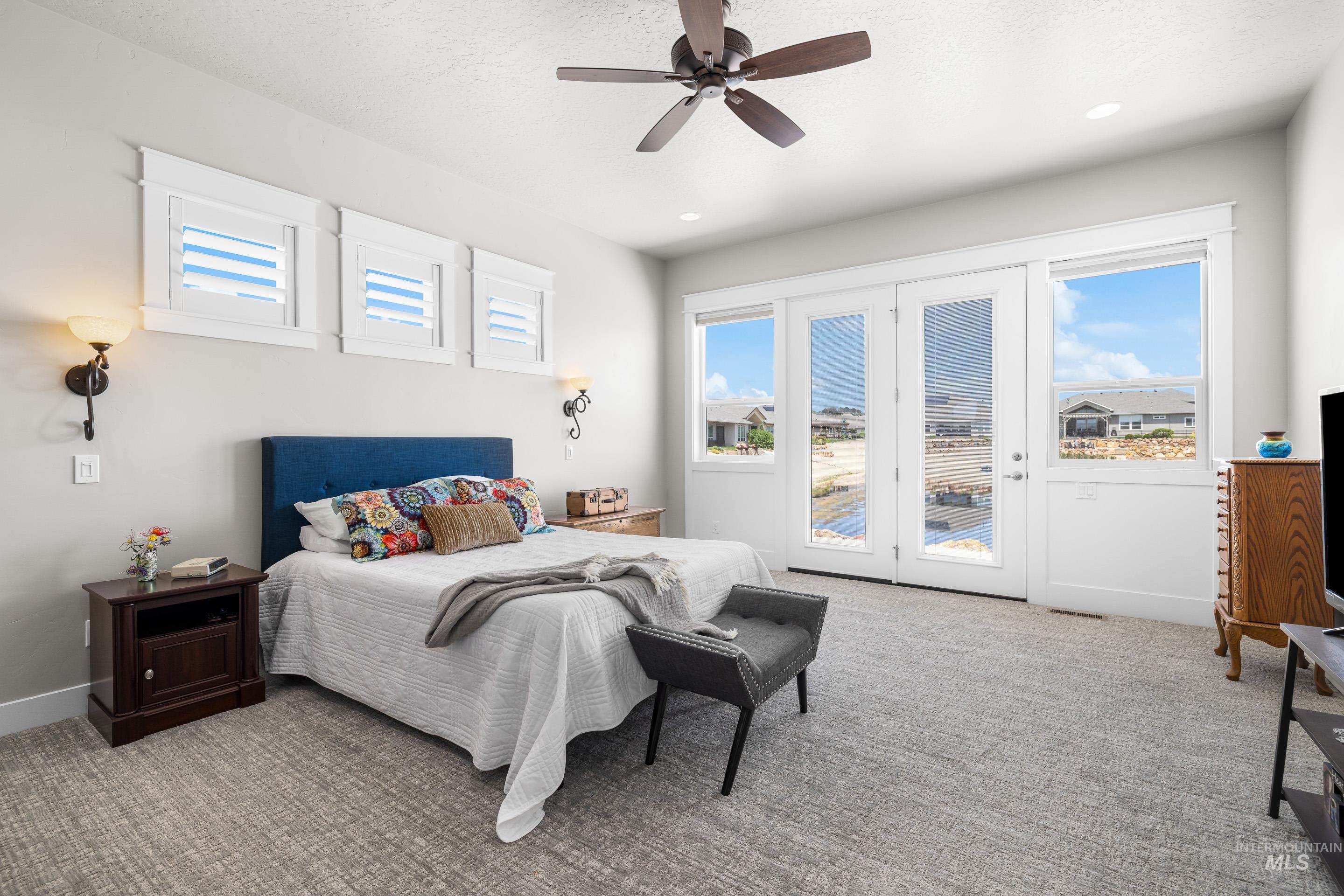 Bedroom featuring access to outside, carpet floors, a ceiling fan, and recessed lighting