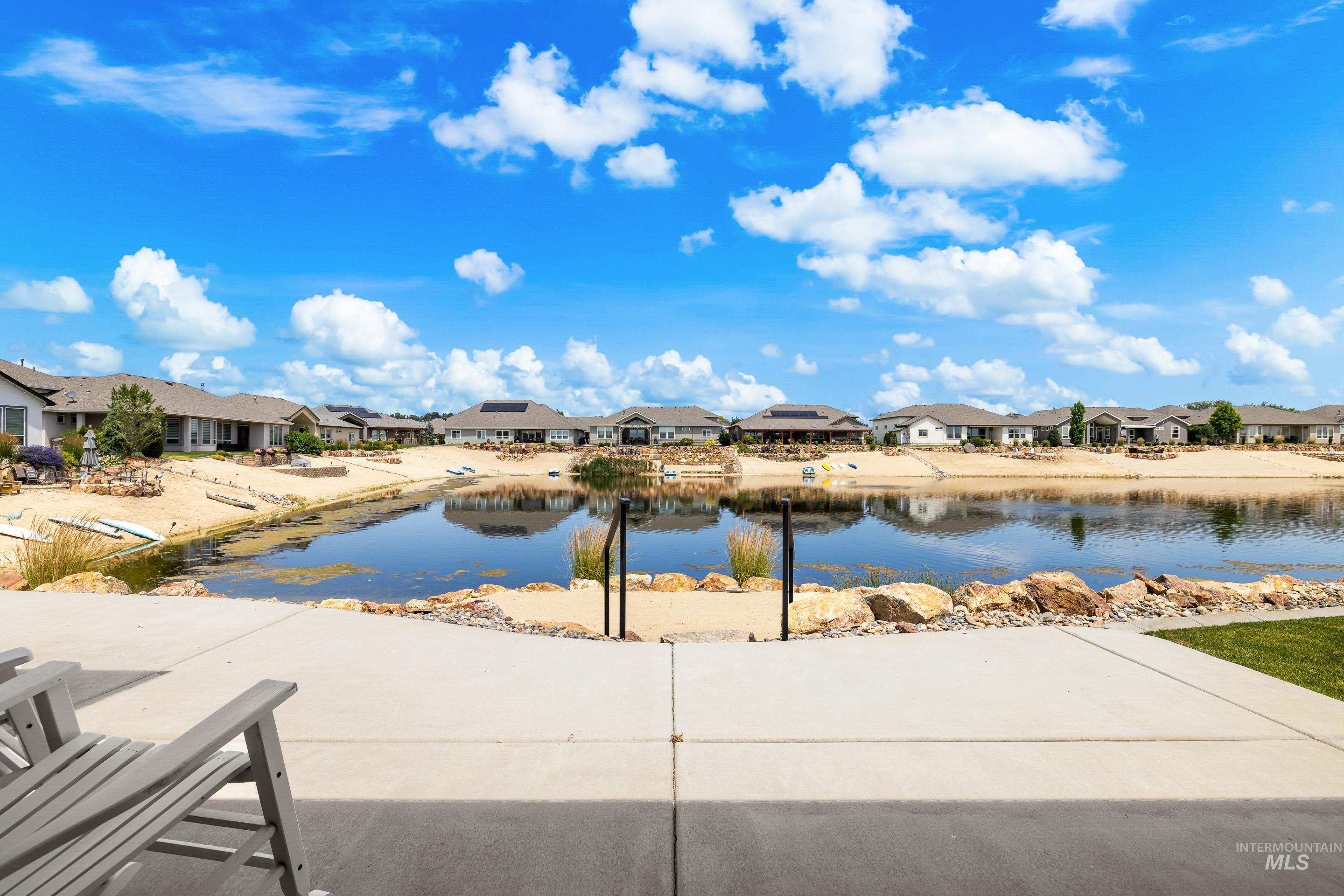 Water view featuring nearby suburban area