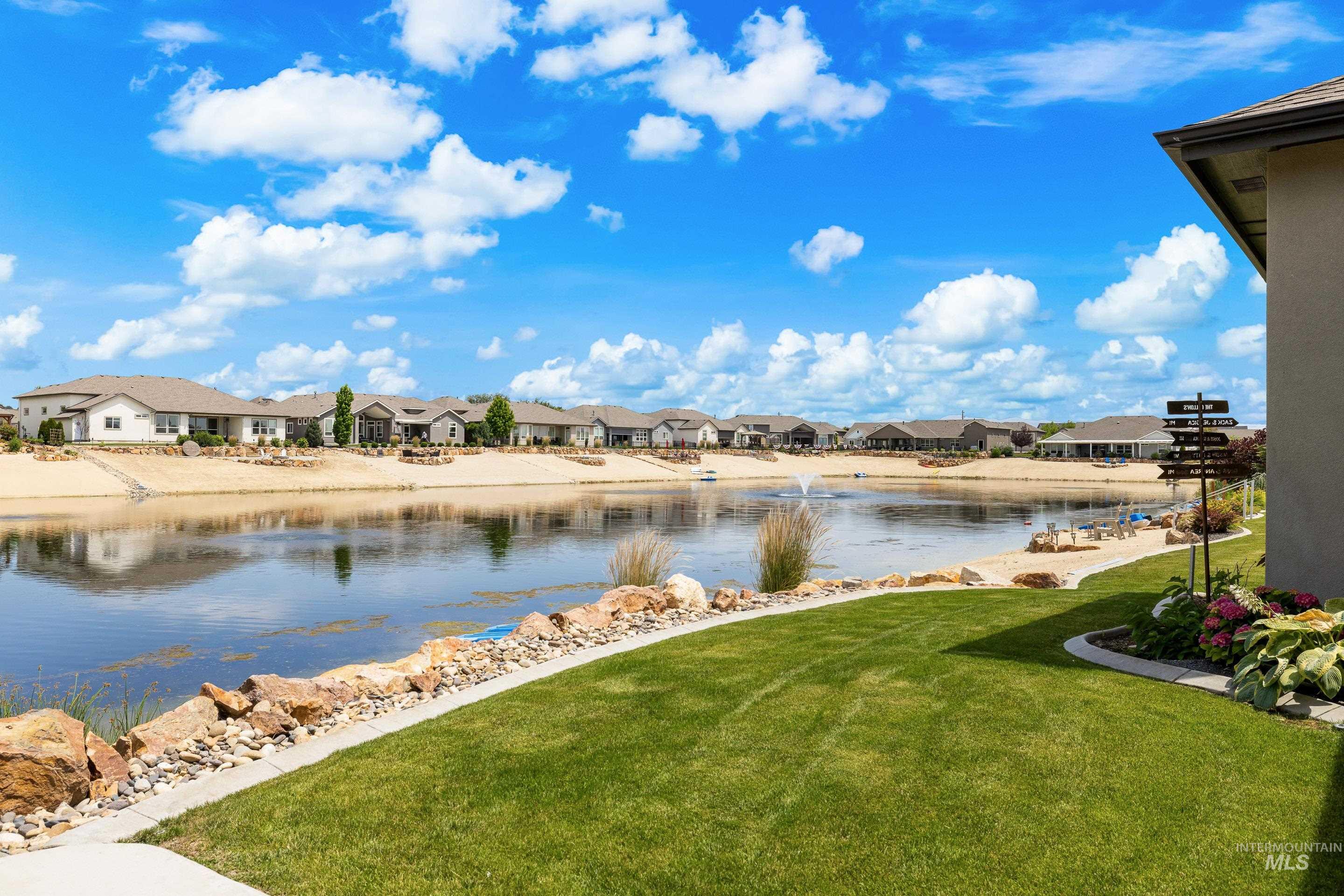 Water view featuring nearby suburban area