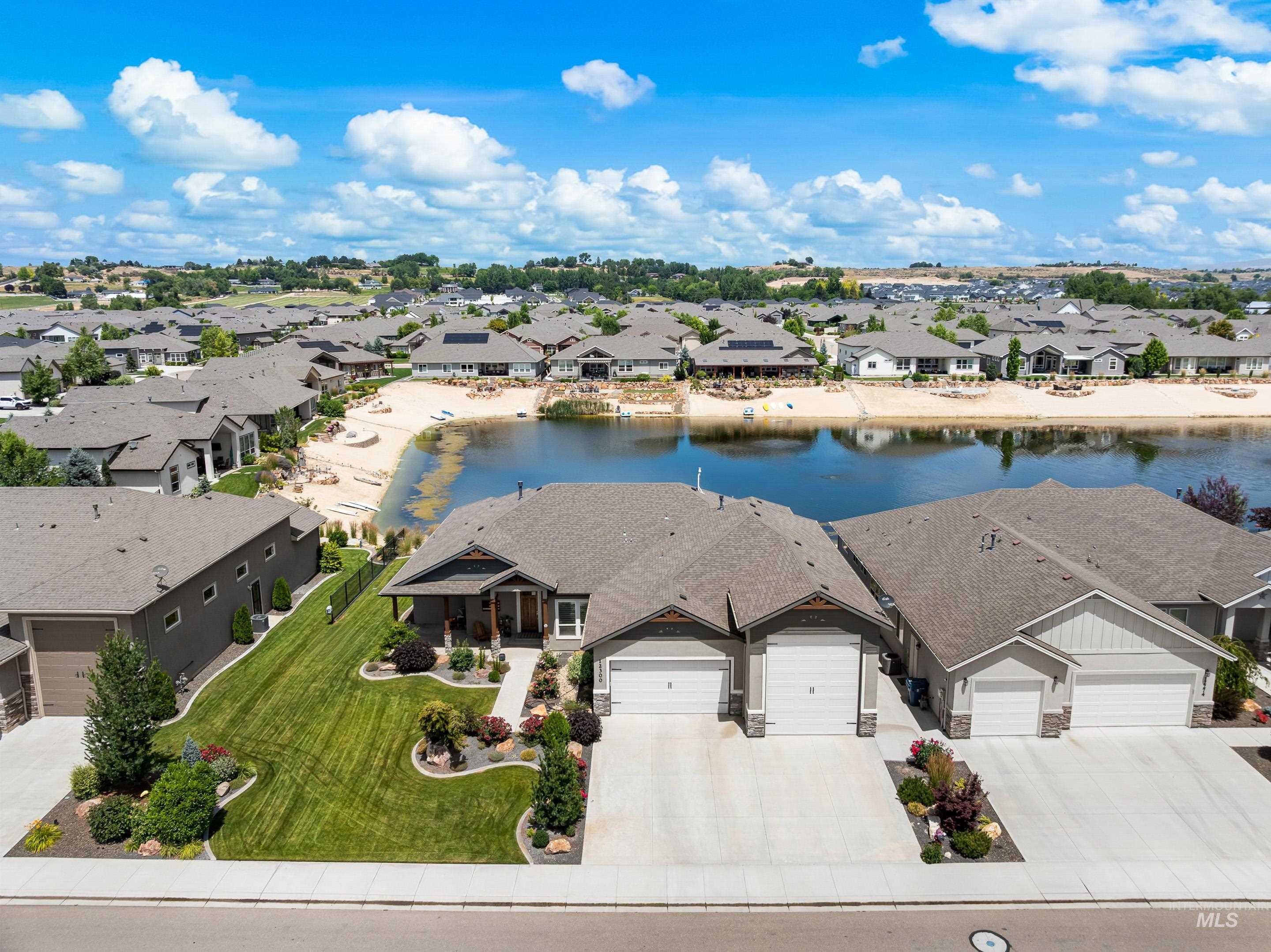 Aerial view of residential area with a large body of water