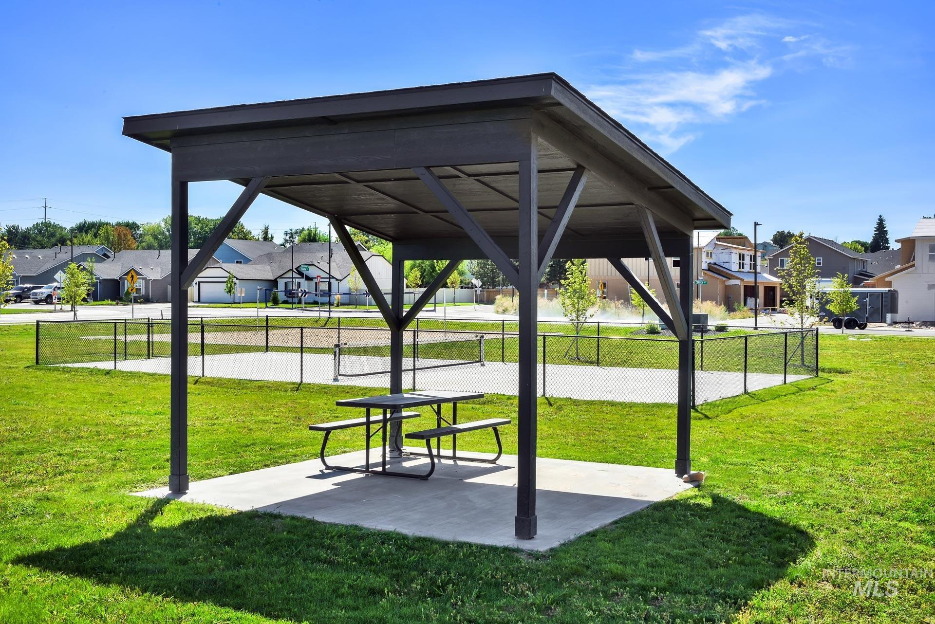 Surrounding community featuring a residential view and a patio area