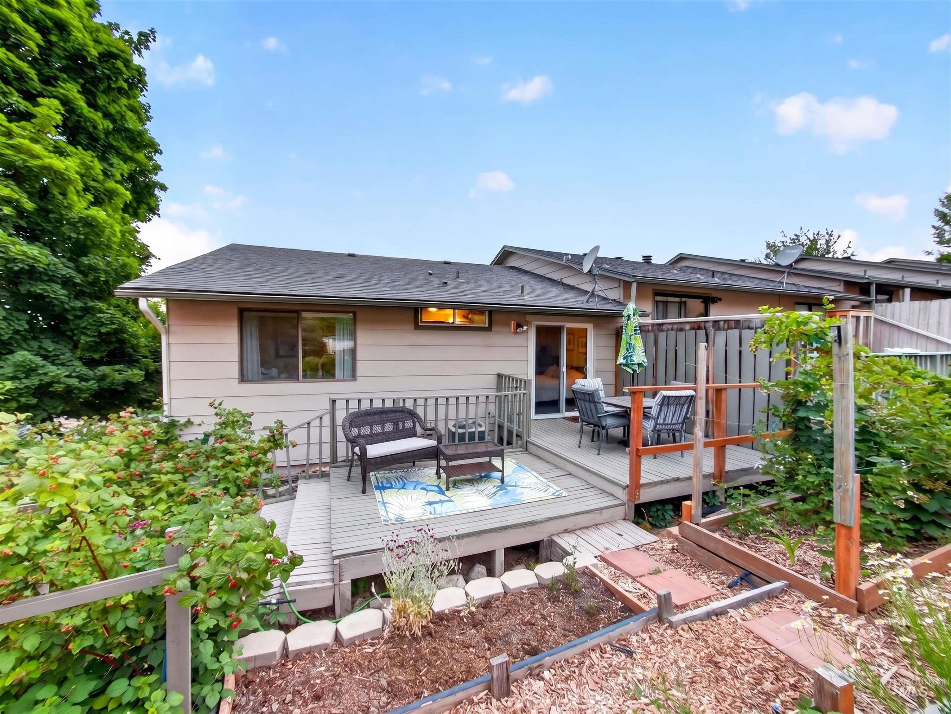 Expansive multi-level wood deck offering outdoor living space