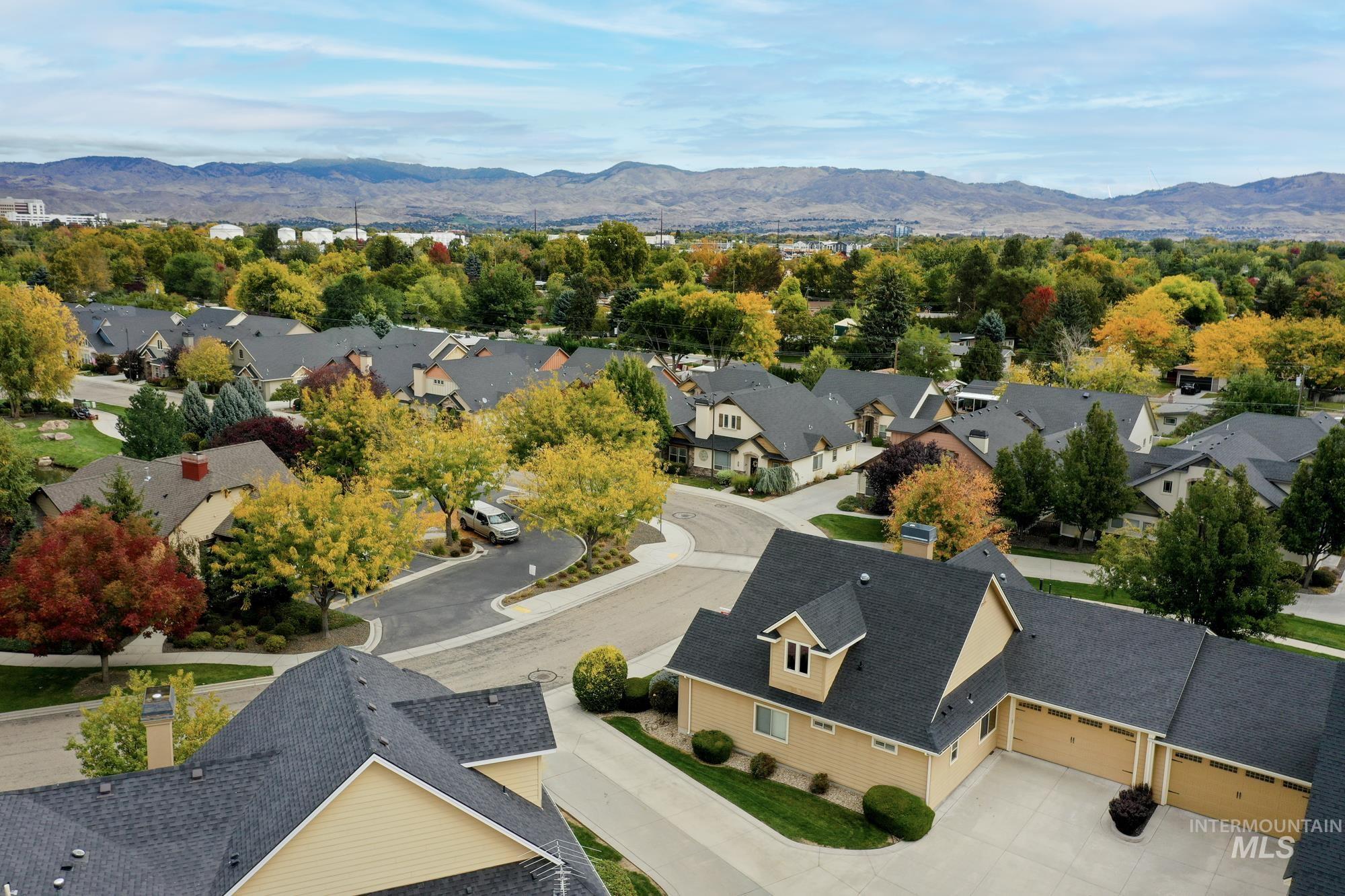 Aerial perspective of suburban area with mountains
