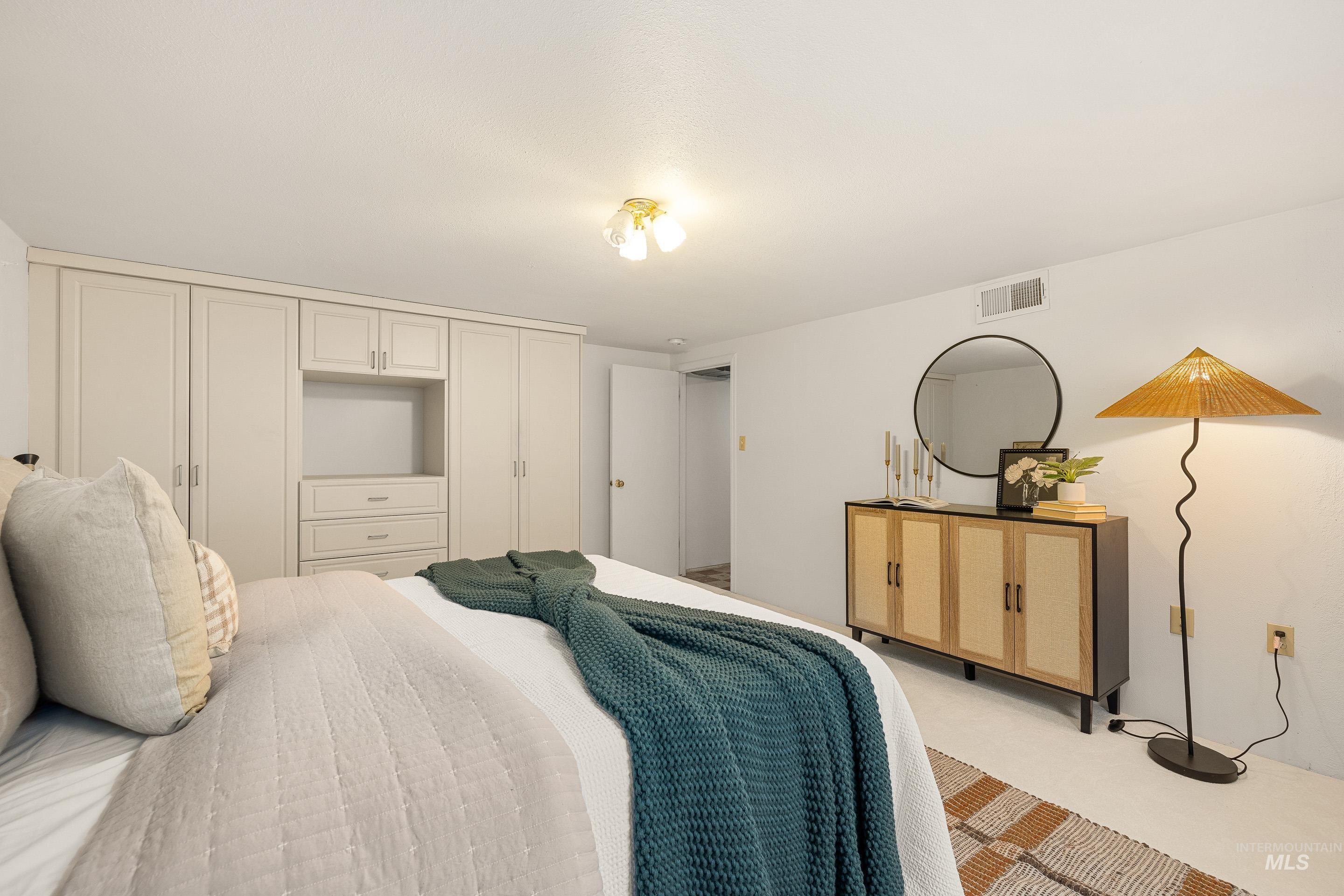 Bedroom featuring a closet and carpet floors
