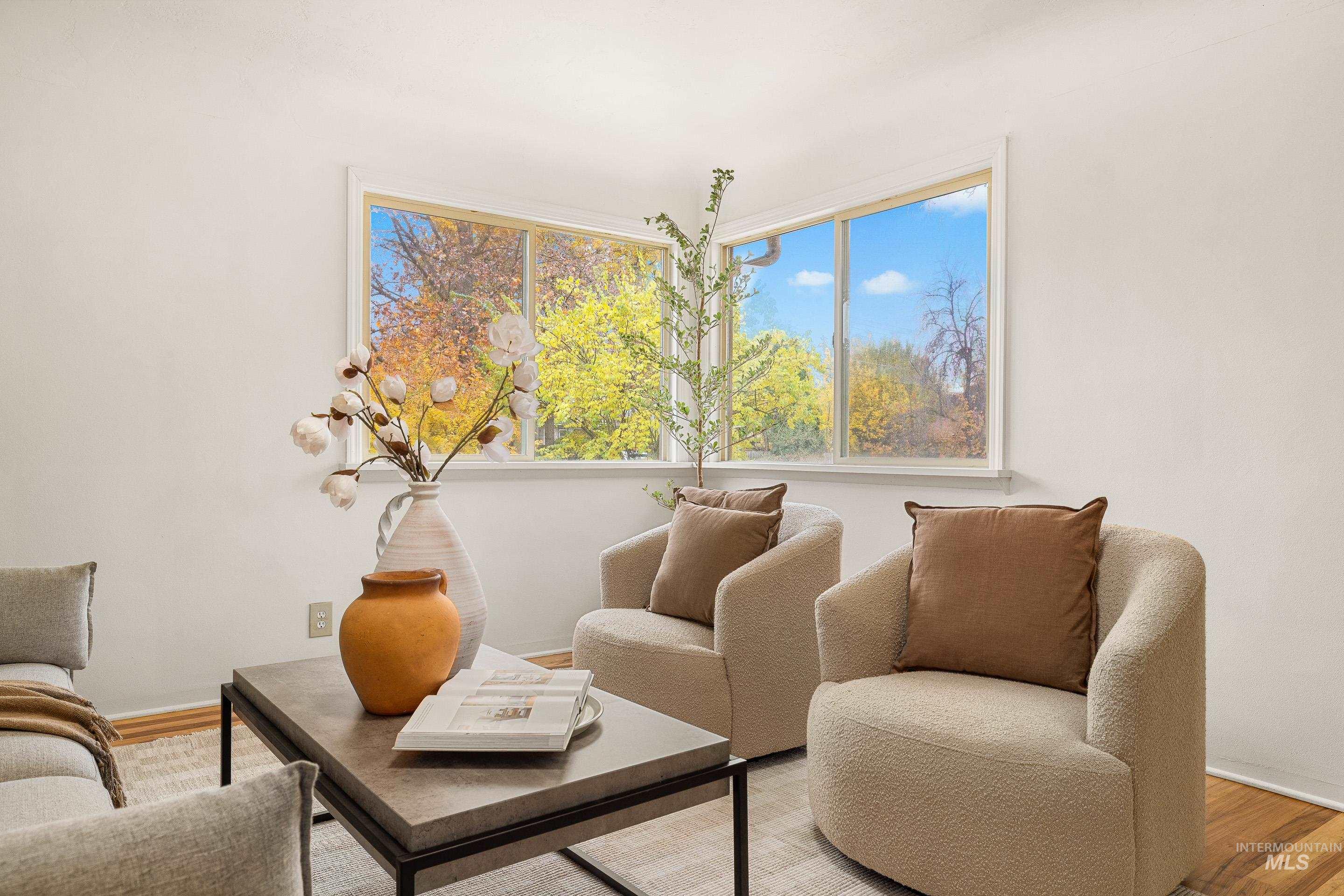 Sitting room featuring wood finished floors