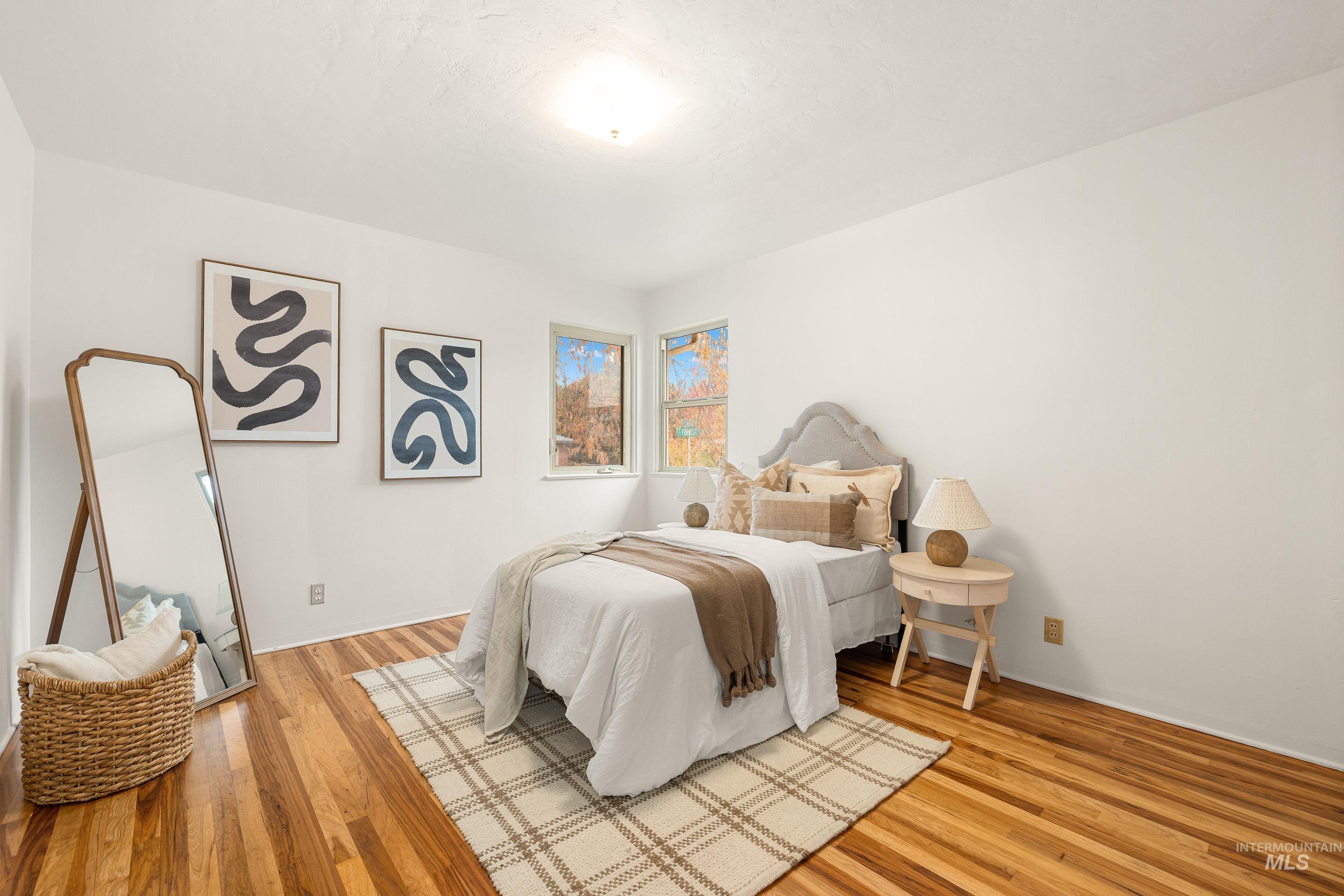 Bedroom featuring light wood-style flooring