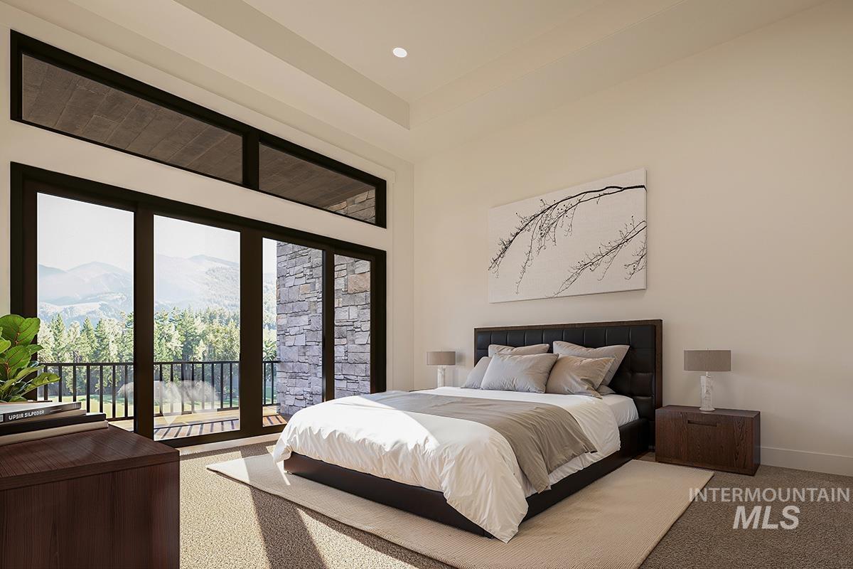 Bedroom featuring access to outside, a mountain view, and carpet flooring