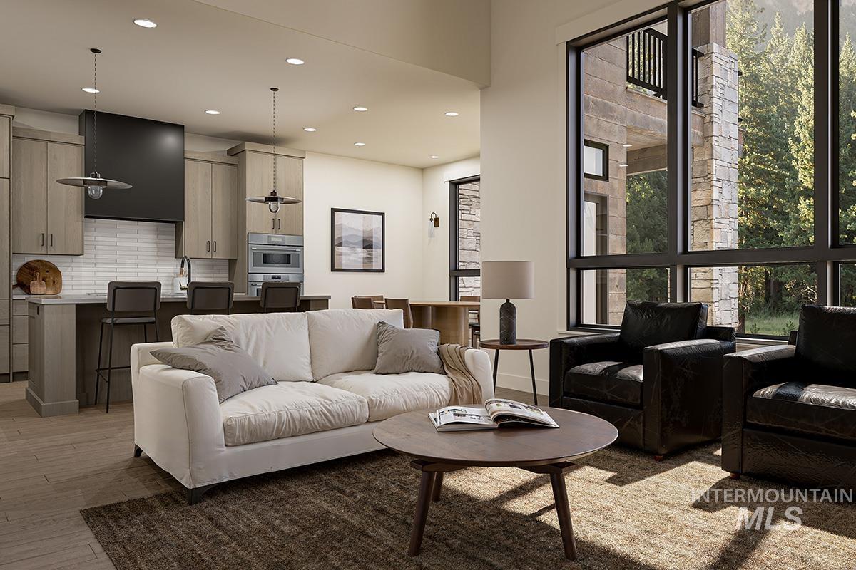 Living area featuring recessed lighting and light wood-style flooring
