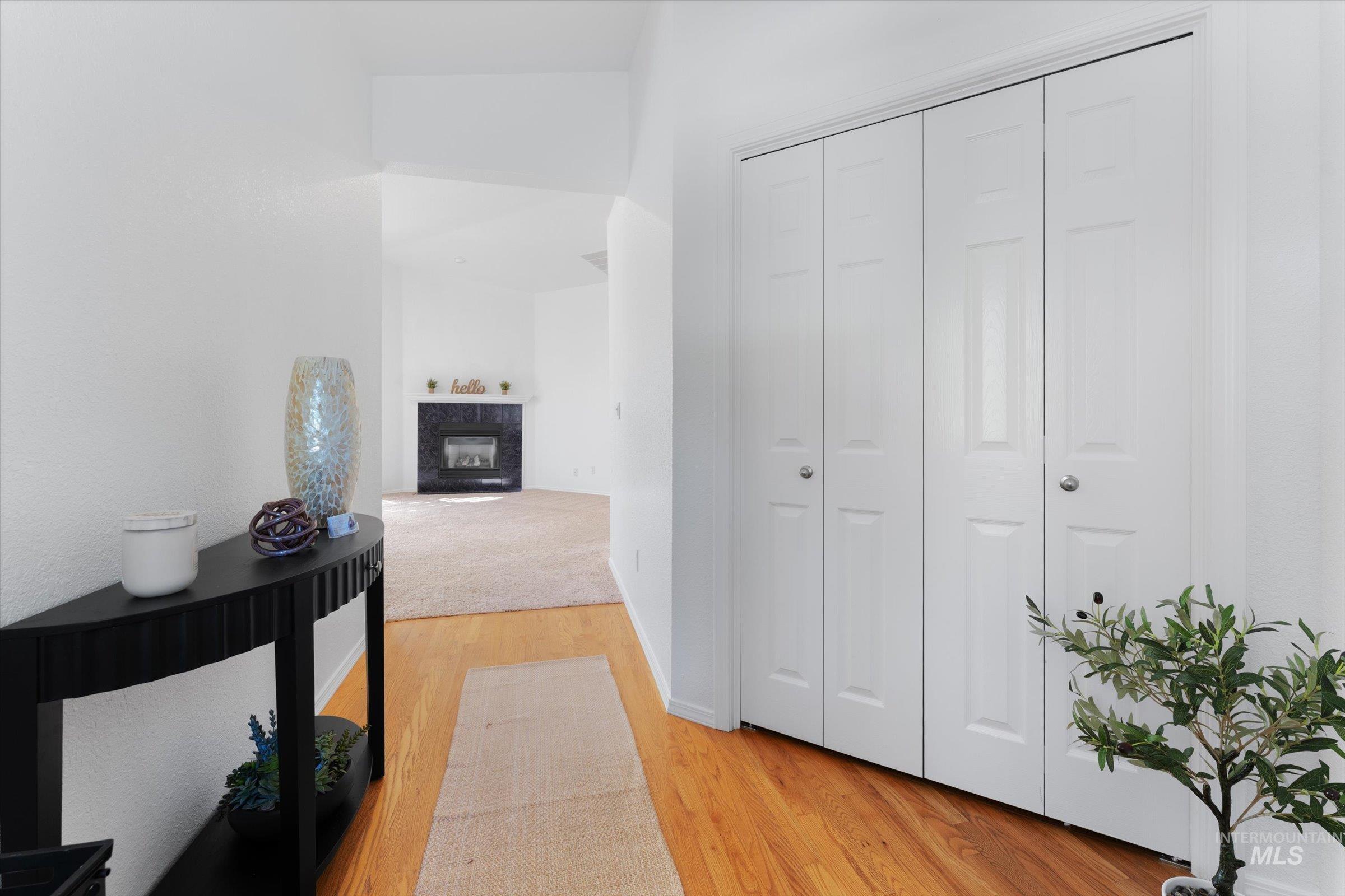 Hall with light wood-style floors